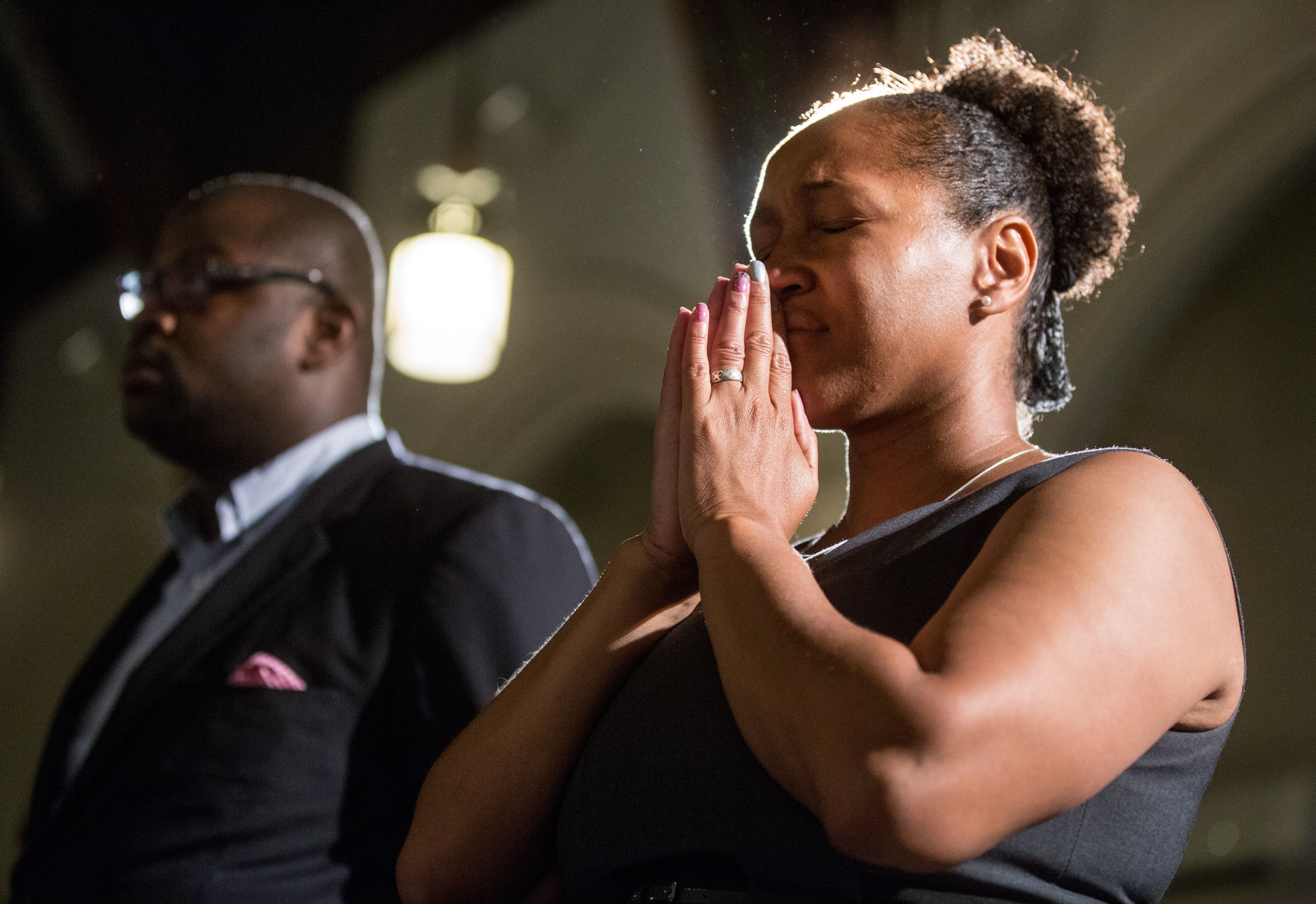 Pastor Daryl Lobban (left) and Mariama White-Hammond prayed during a vigil for victims of the church shooting in South Carolina.