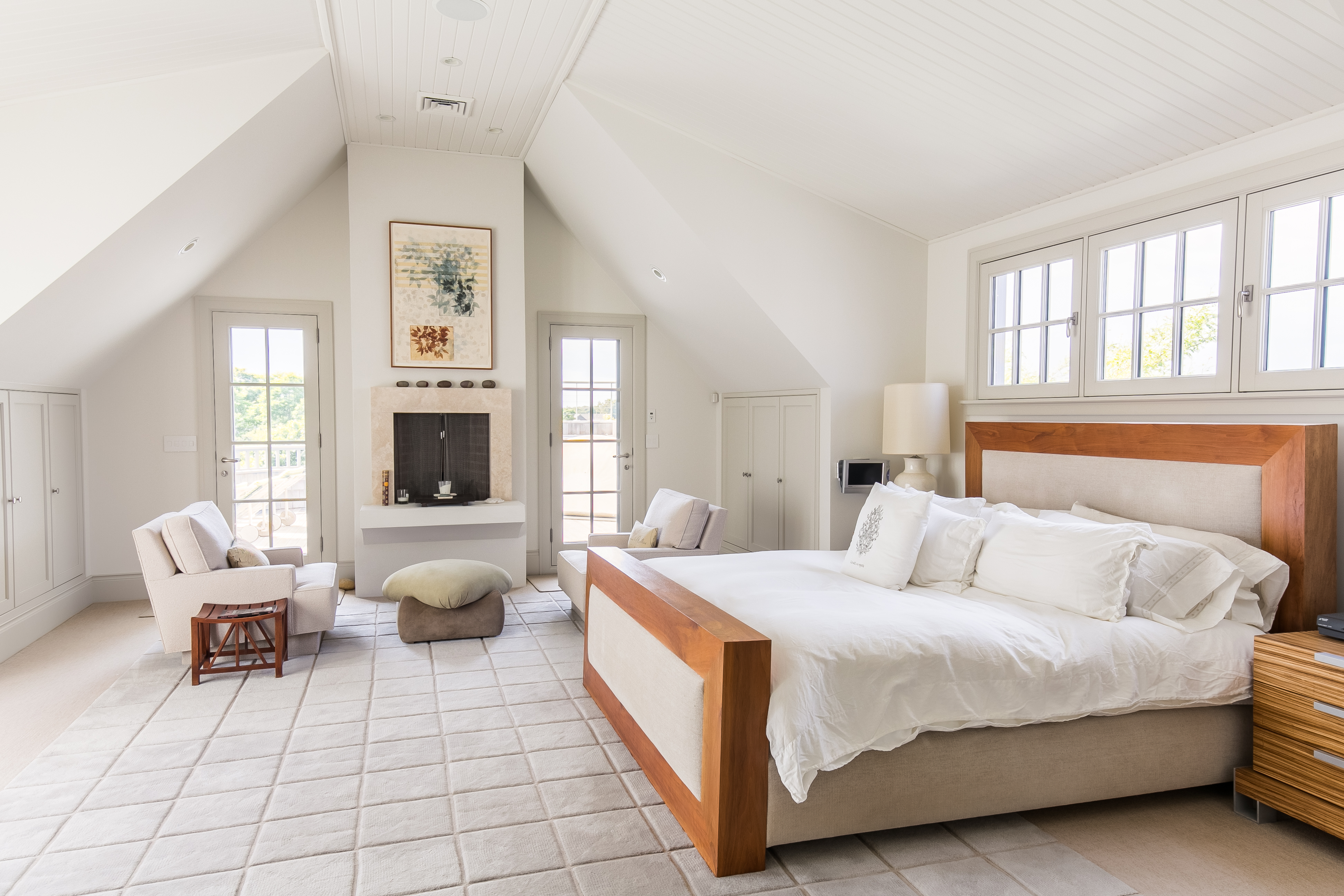 The master suite features a fireplace, as well as a private deck and “spectacular water views,” the listing states.