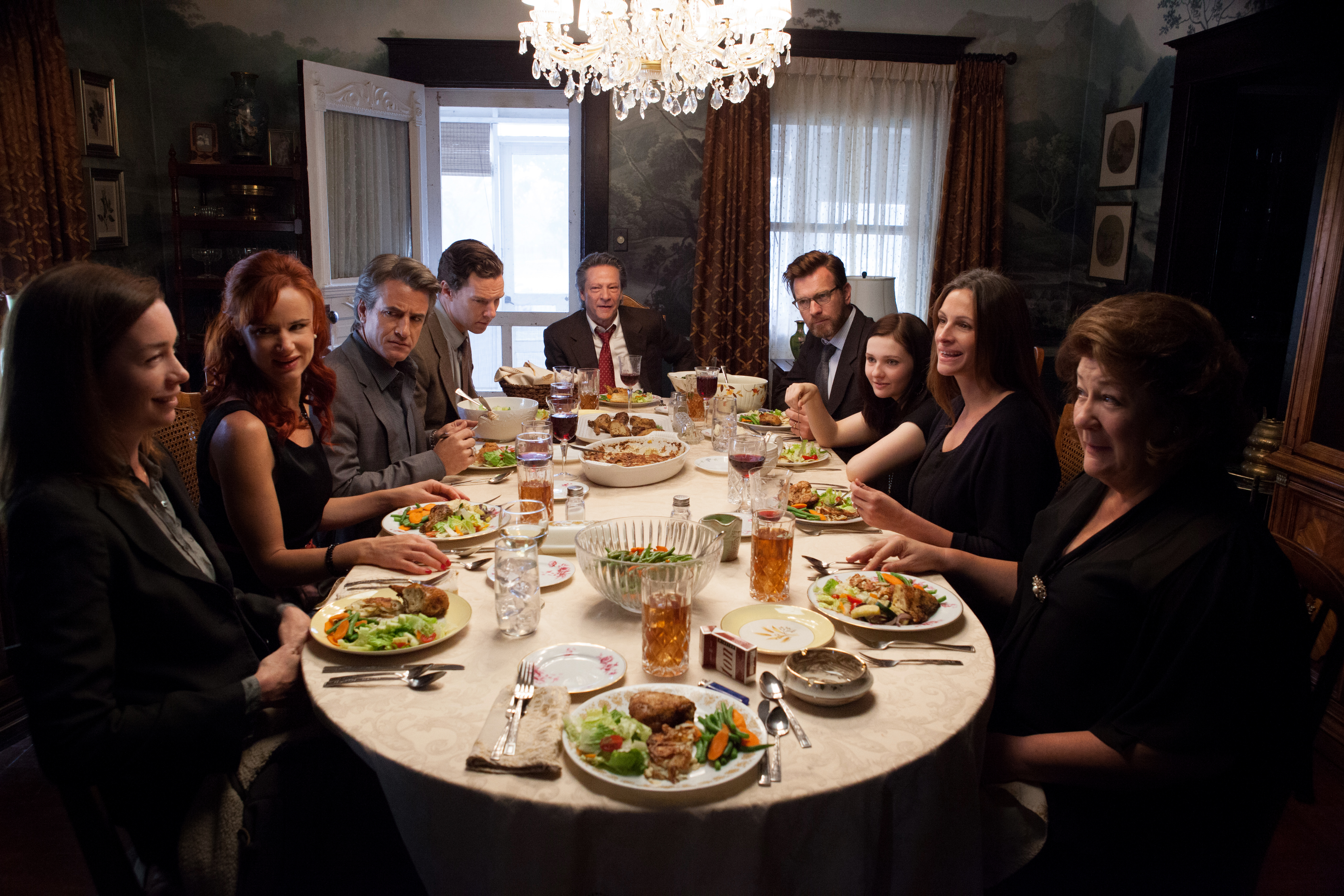 (L-R) JULIANNE NICHOLSON, JULIETTE LEWIS, DERMOT MULRONEY, BENEDICT CUMBERBATCH, CHRIS COOPER, EWAN McGREGOR, ABIGAIL BRESLIN, JULIA ROBERTS and MARGO MARTINDALE in the 2013 film "AUGUST: OSAGE COUNTY," directed by John Wells. PHOTO CREDIT: Claire Folger/Weinstein Company 13cumberbatch