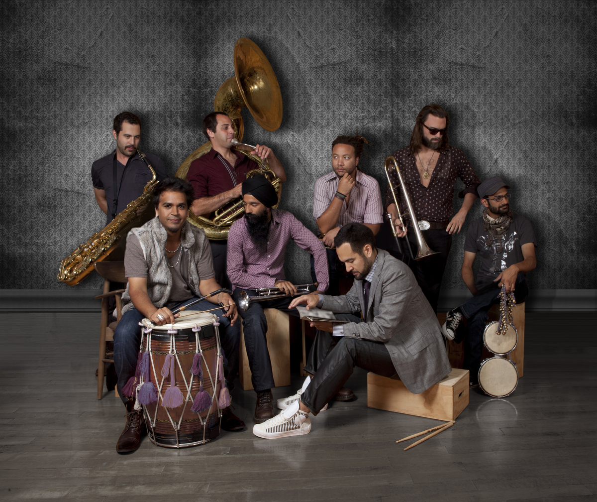 With his dhol, a two-sided drum from the Punjab region, Sunny Jain (left front) brings Red Baraat to Bosto