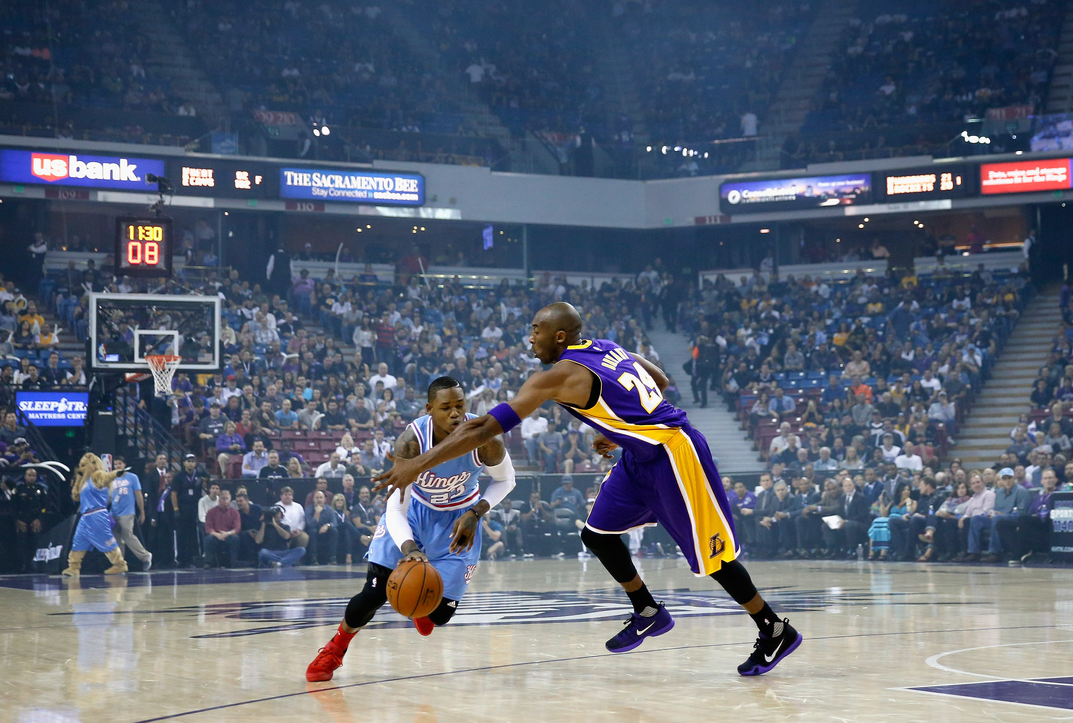 Sacramento’s Ben McLemore is fouled by Kobe Bryant in Friday’s game.