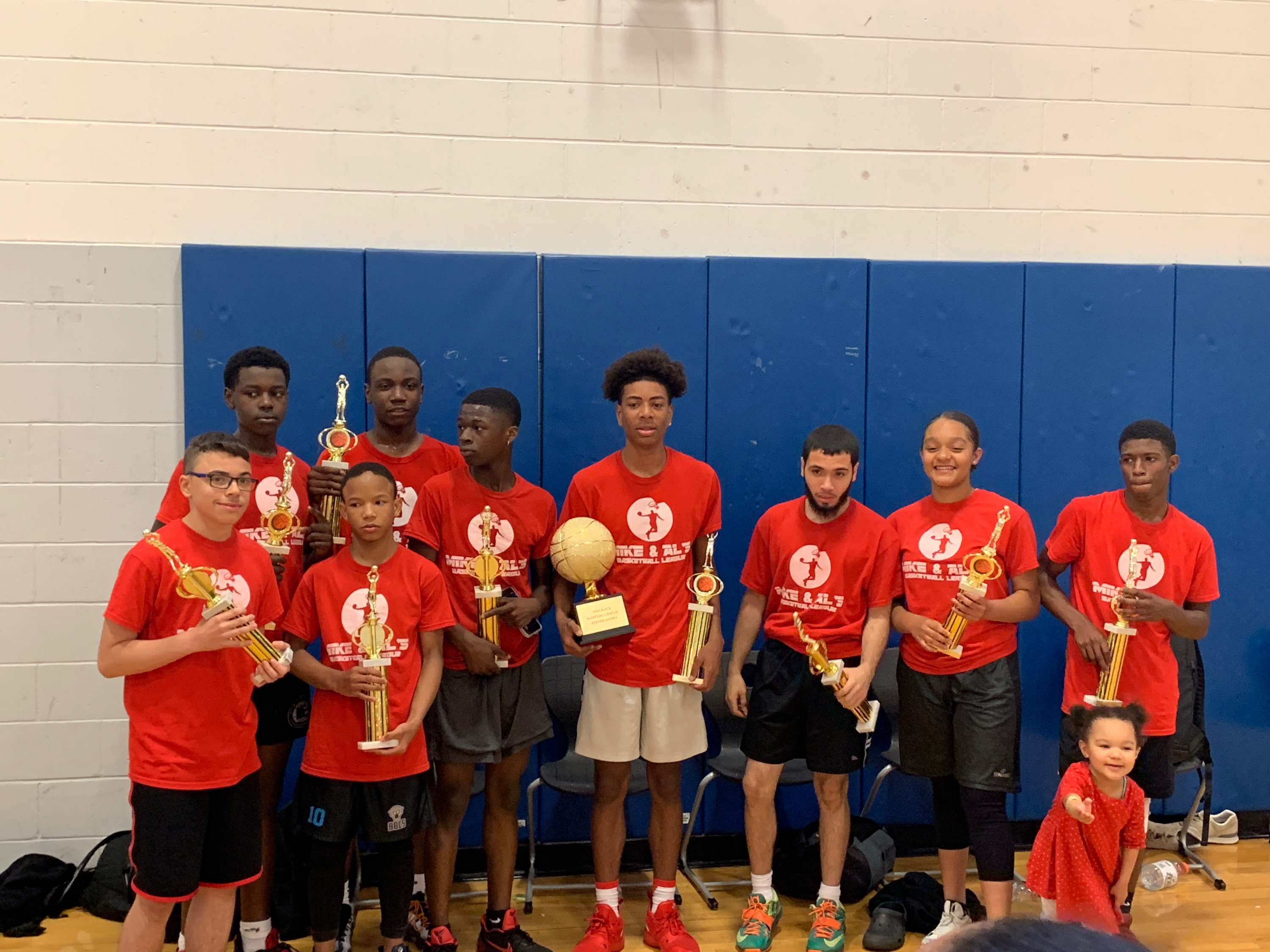 The 2019 spring championship team and most valuable male and female players for Mike & Al’s Basketball League, a program run by Project RIGHT.
