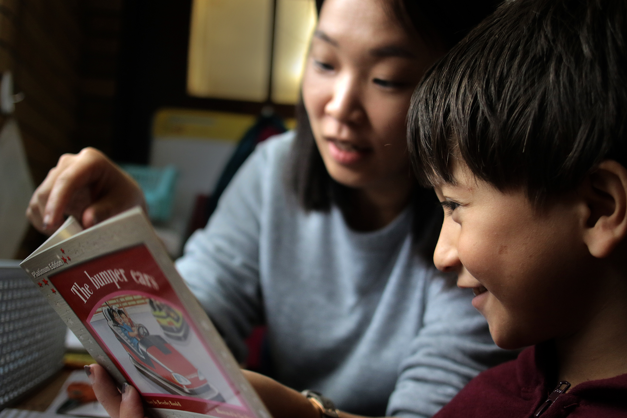 Estevan Vilorio worked with teacher Jeesun Yoo in a reading program at the Kennedy School.
