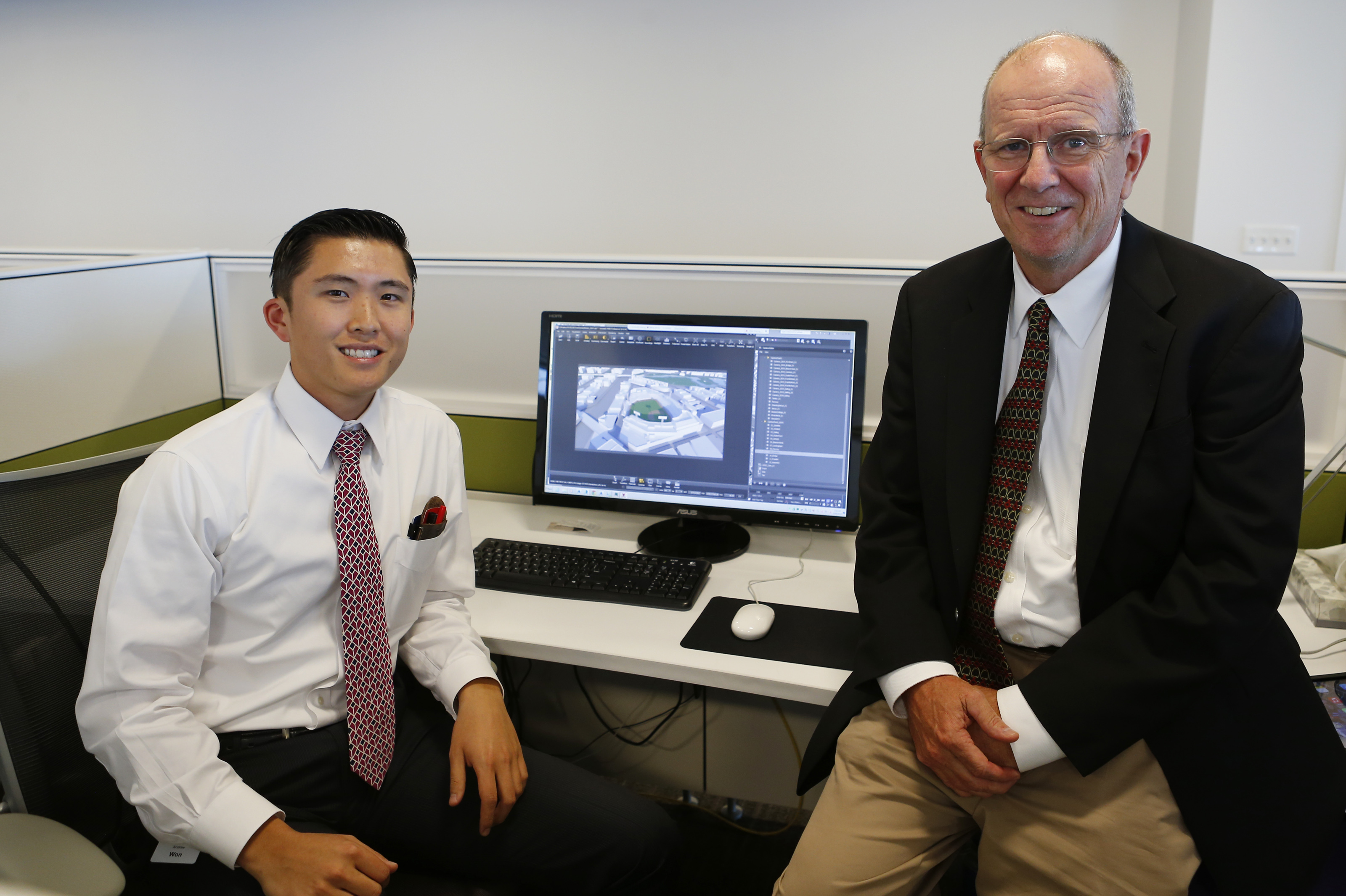 Suffolk Construction innovation officer Peter Campot, with project engineer Andrew Won, said the model helps visualize how traffic or other issues would be affected.