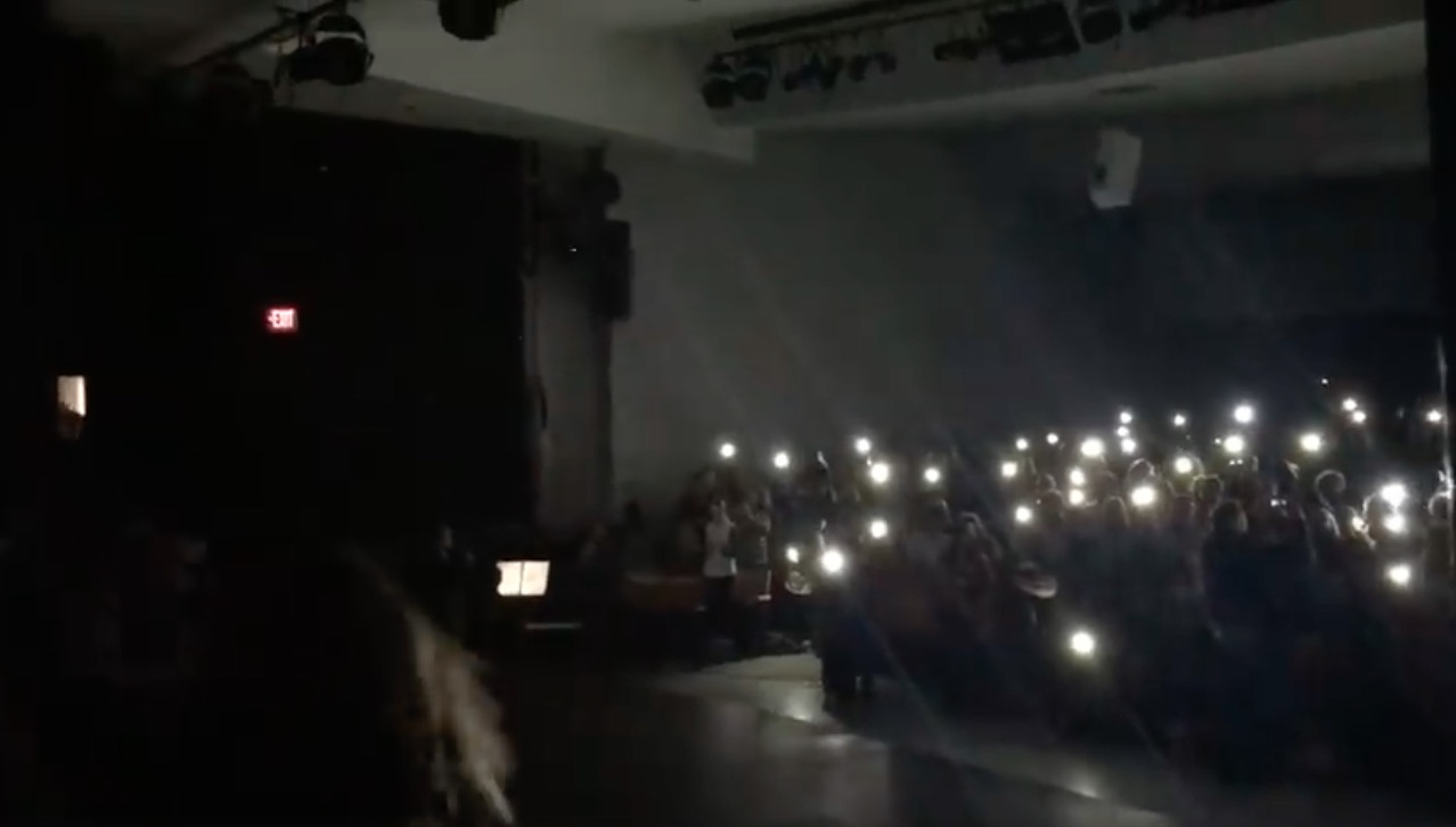 The audience lit the stage with their smartphones when the lights cut out during a middle school play.