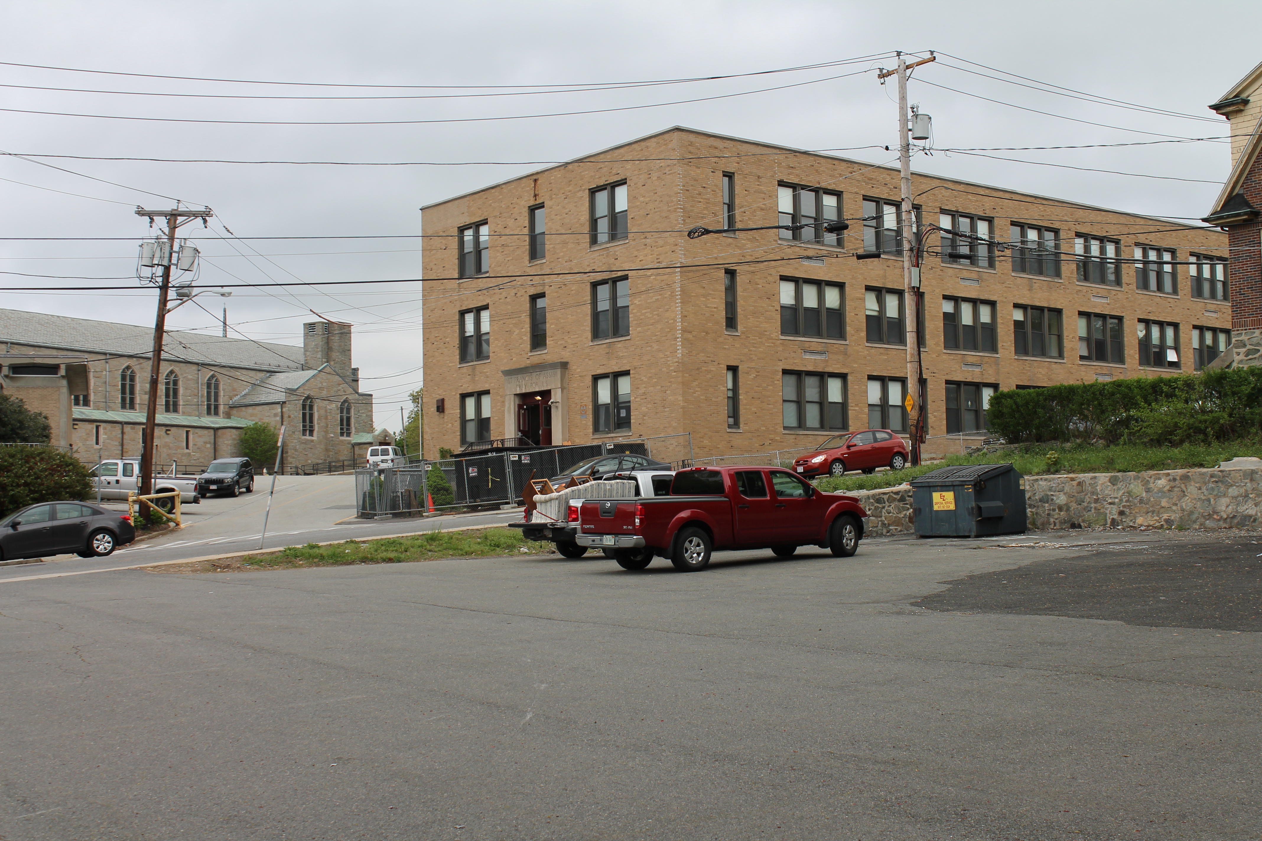 The former St. Francis of Assisi School will offer nine triplexes and nine flats.
