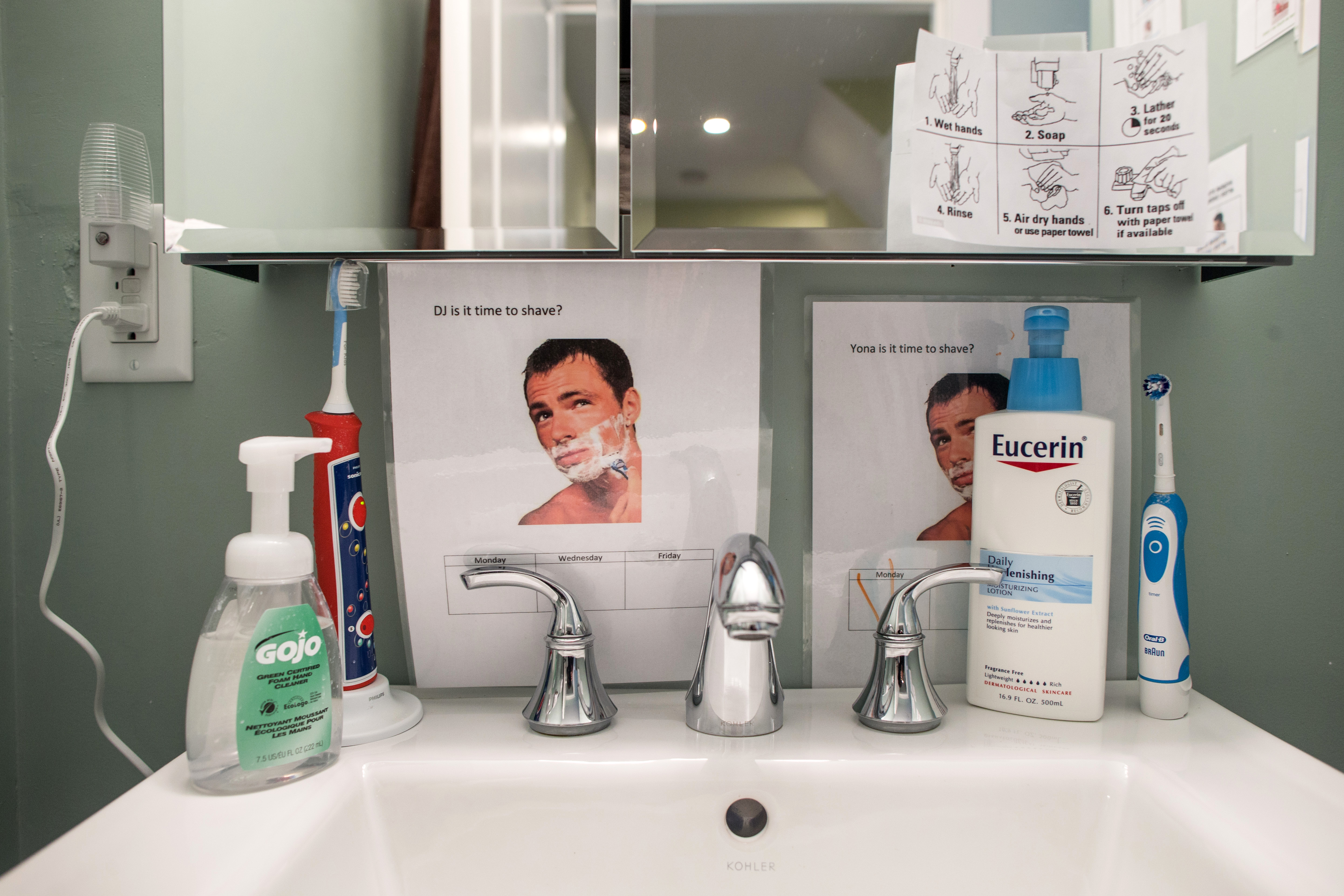 A shaving reminder sign in D.J.’s bathroom.