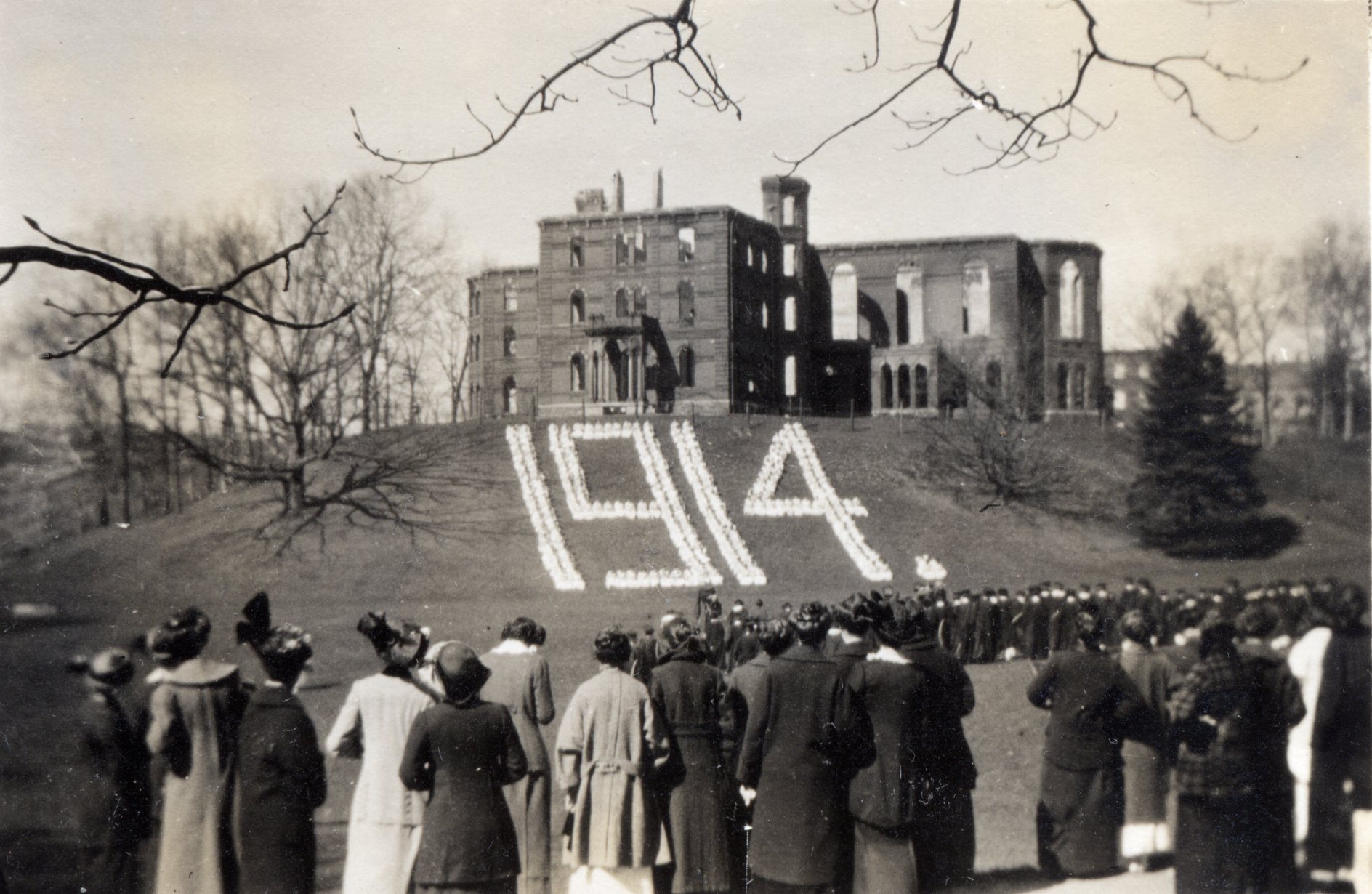 Students marked May Day 1914 with the hall’s ruins as a backdrop.