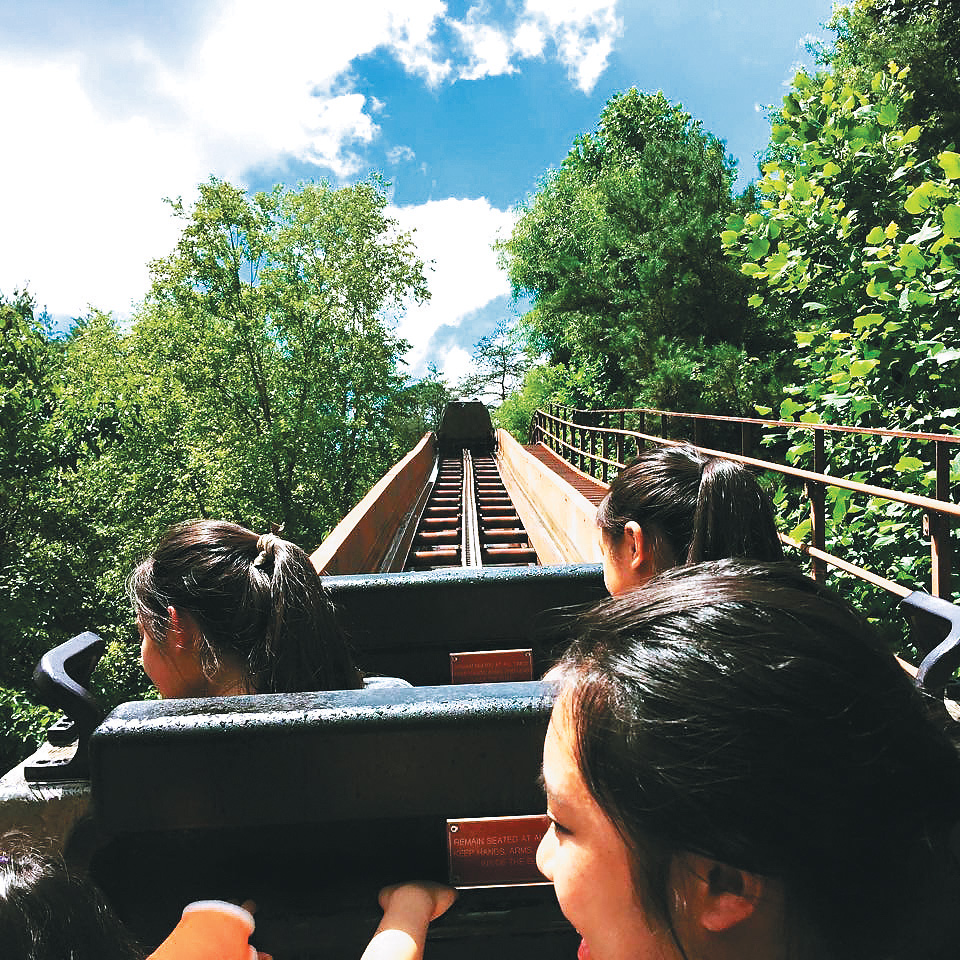 Anticipating a steep and wet plunge on the flume.