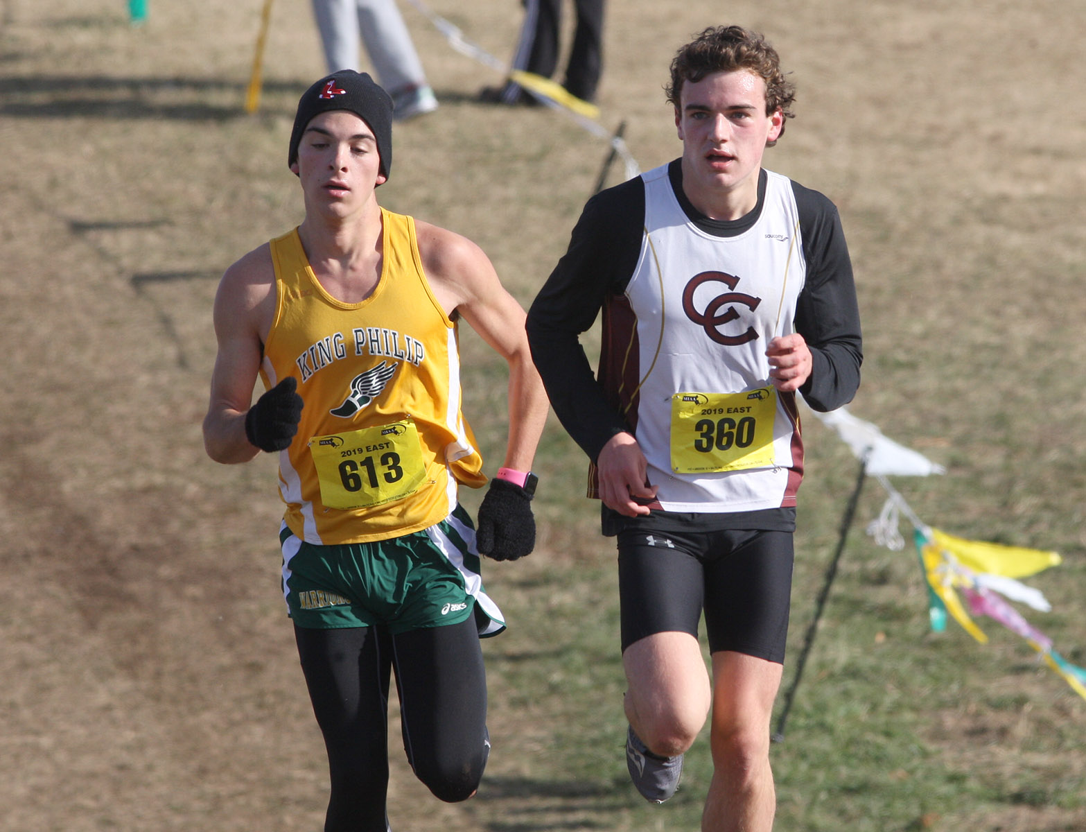 King Philip’s Michael Griffin (Bib no. 613) keeps pace with Concord-Carlisle’s William Chaffin in one of the most exciting races of the day . . .