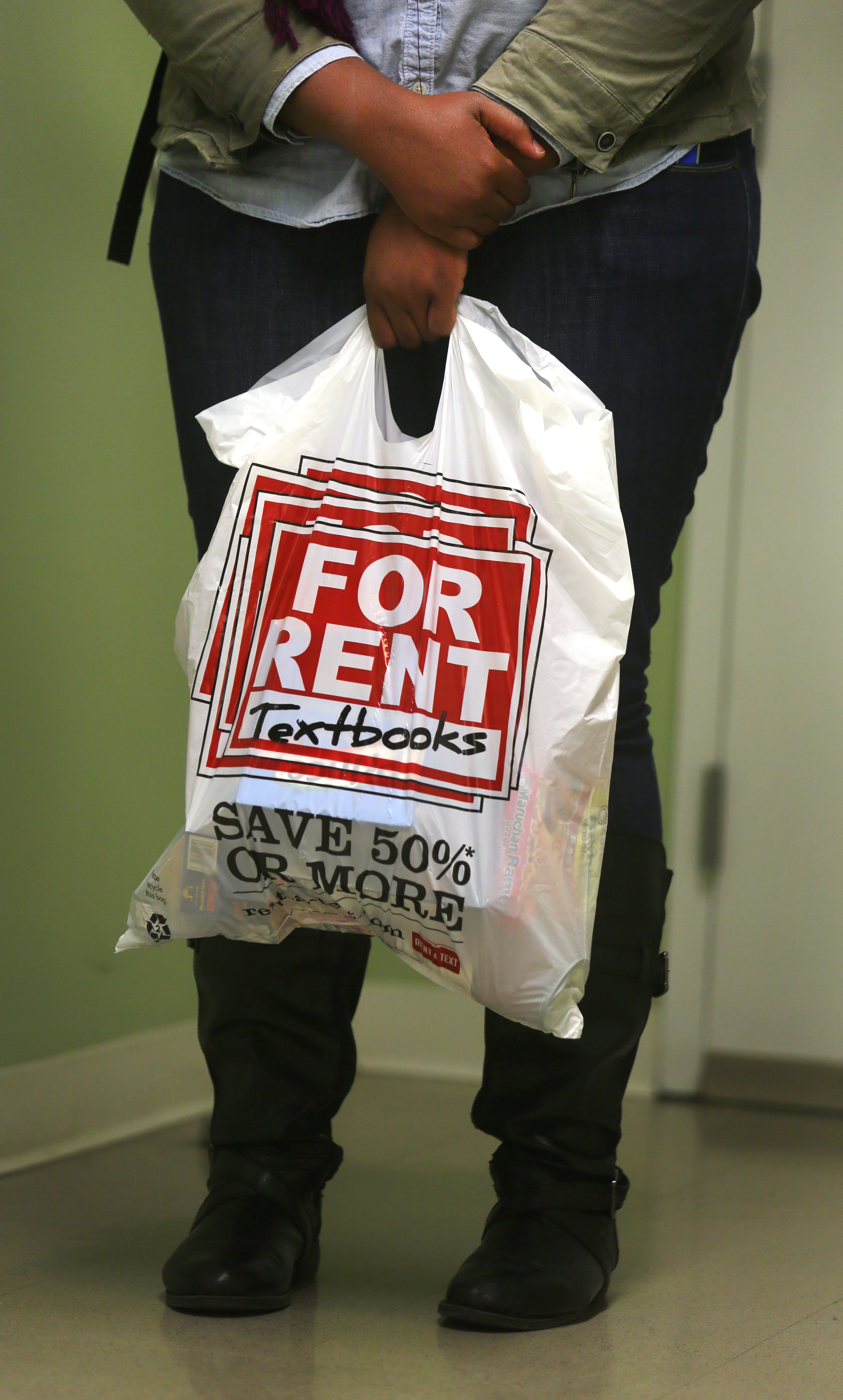 A UMass Boston student, who declined to be identified, held a bag of food preselected for her.
