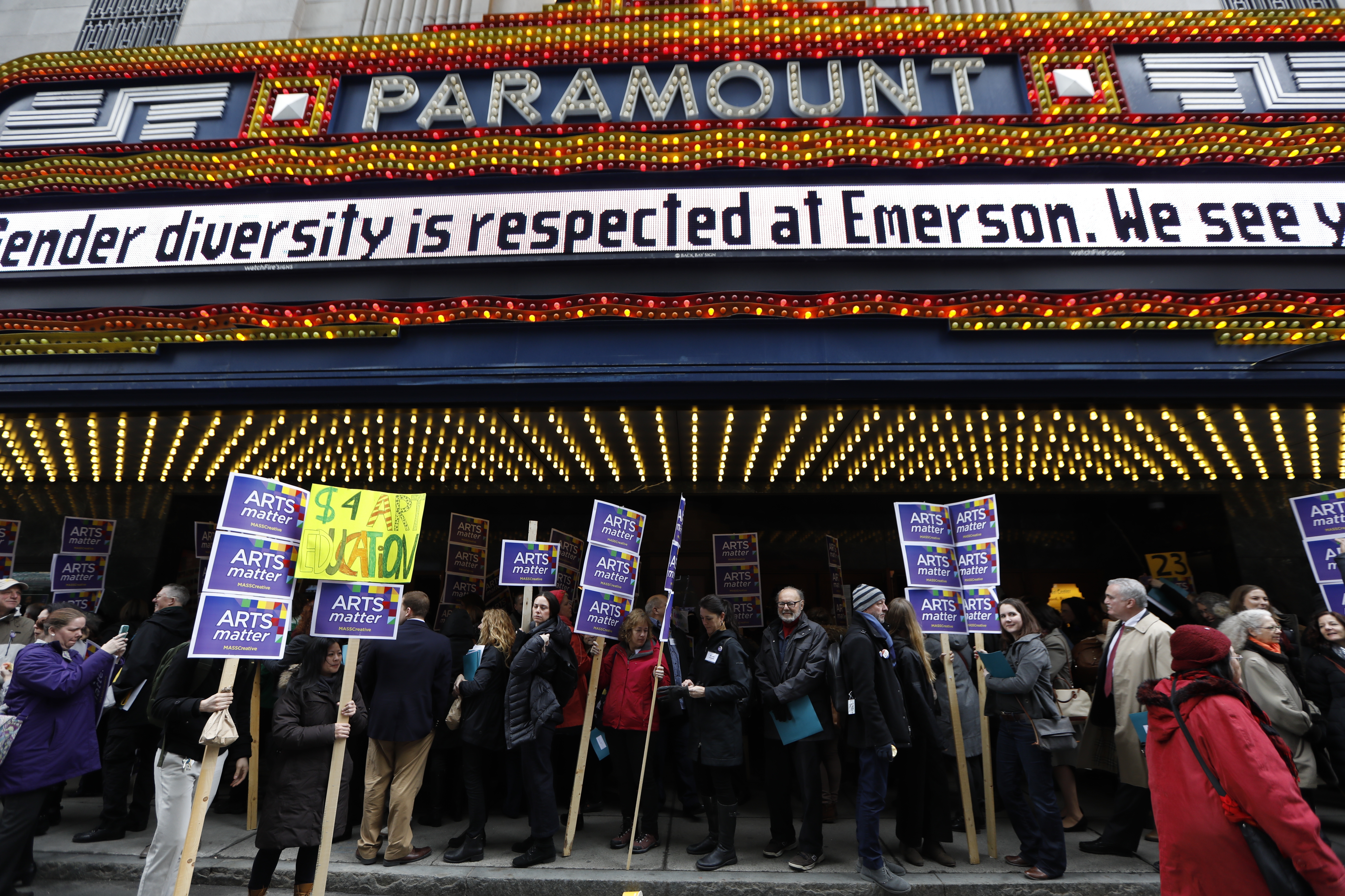 Advocates gathered at the Paramount Center before marching to the State House.