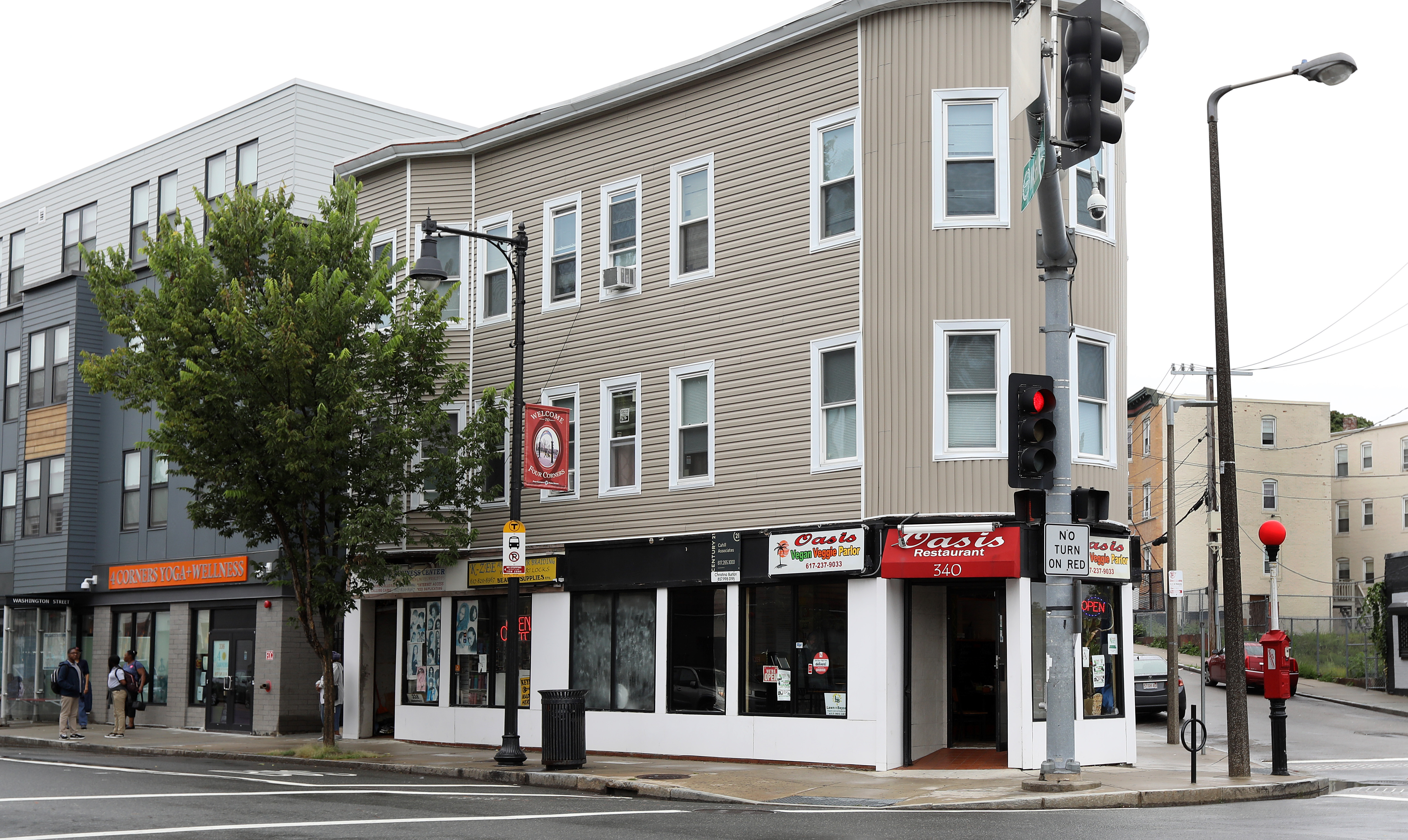 Mackenzie, Ra Kiros, and Coppin are co-own the restaurant, located at 340 Washington St. in Dorchester.
