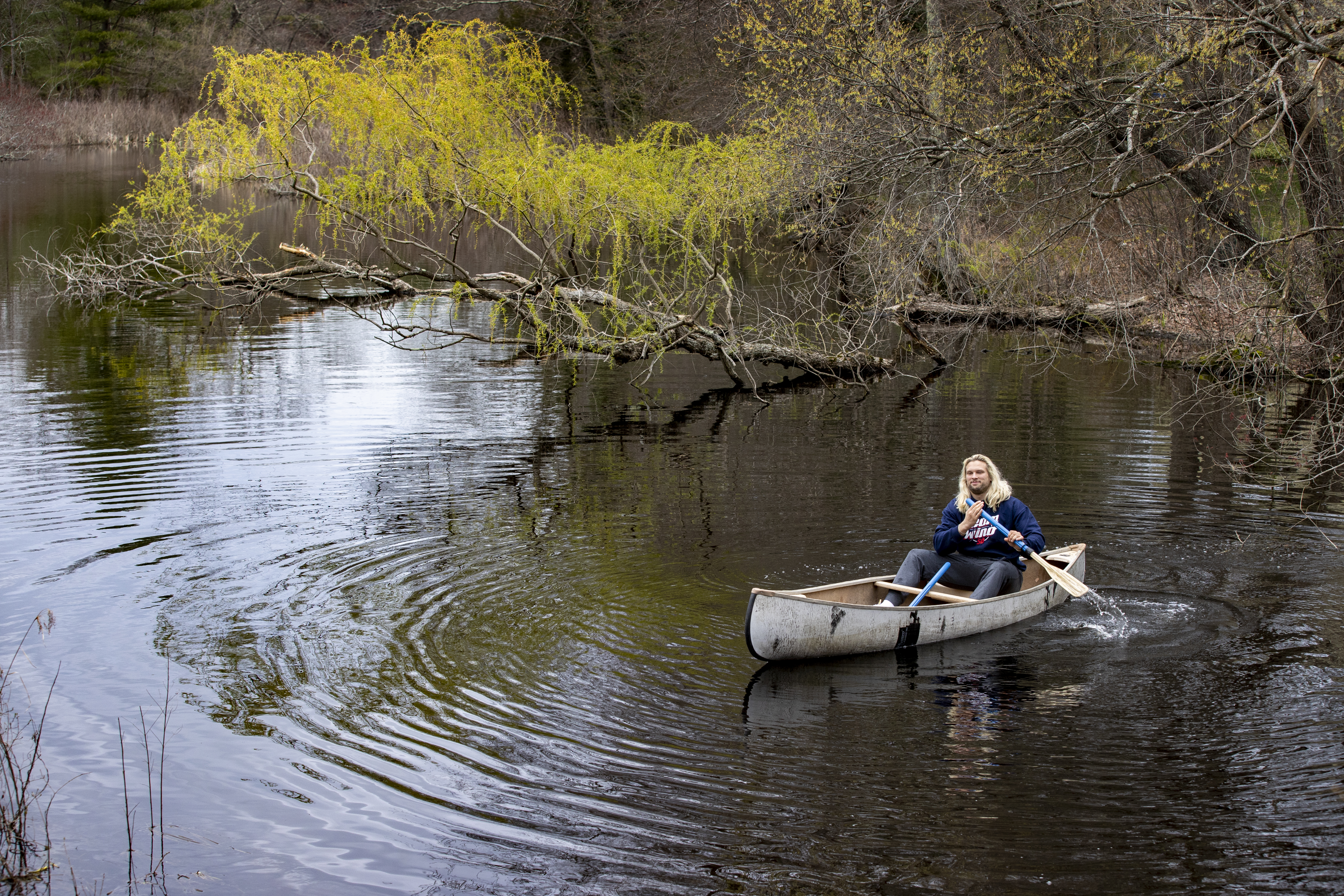 Winovich sometimes paddles his canoe in a Foxborough pond.