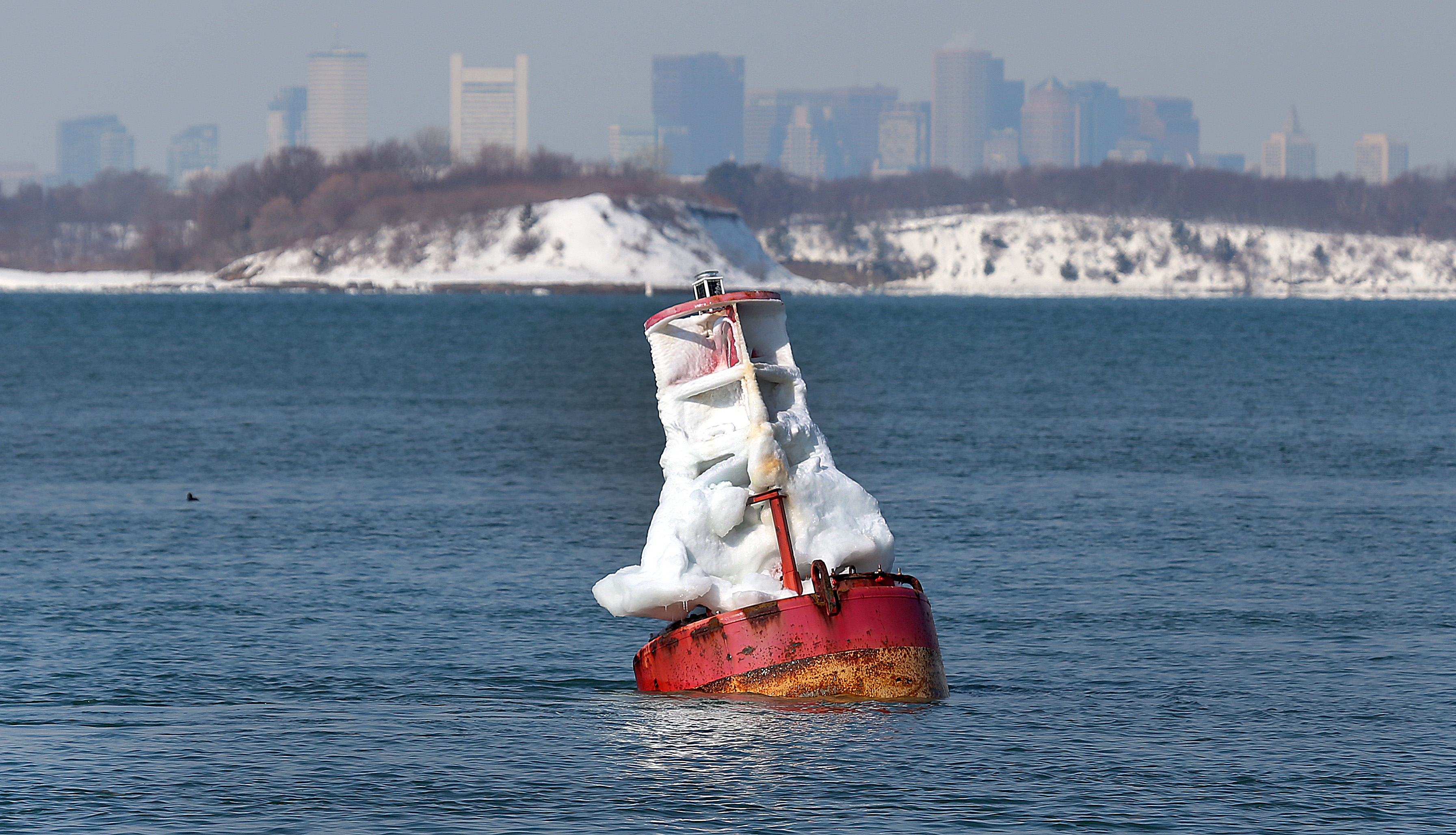A buoy covered with ice.