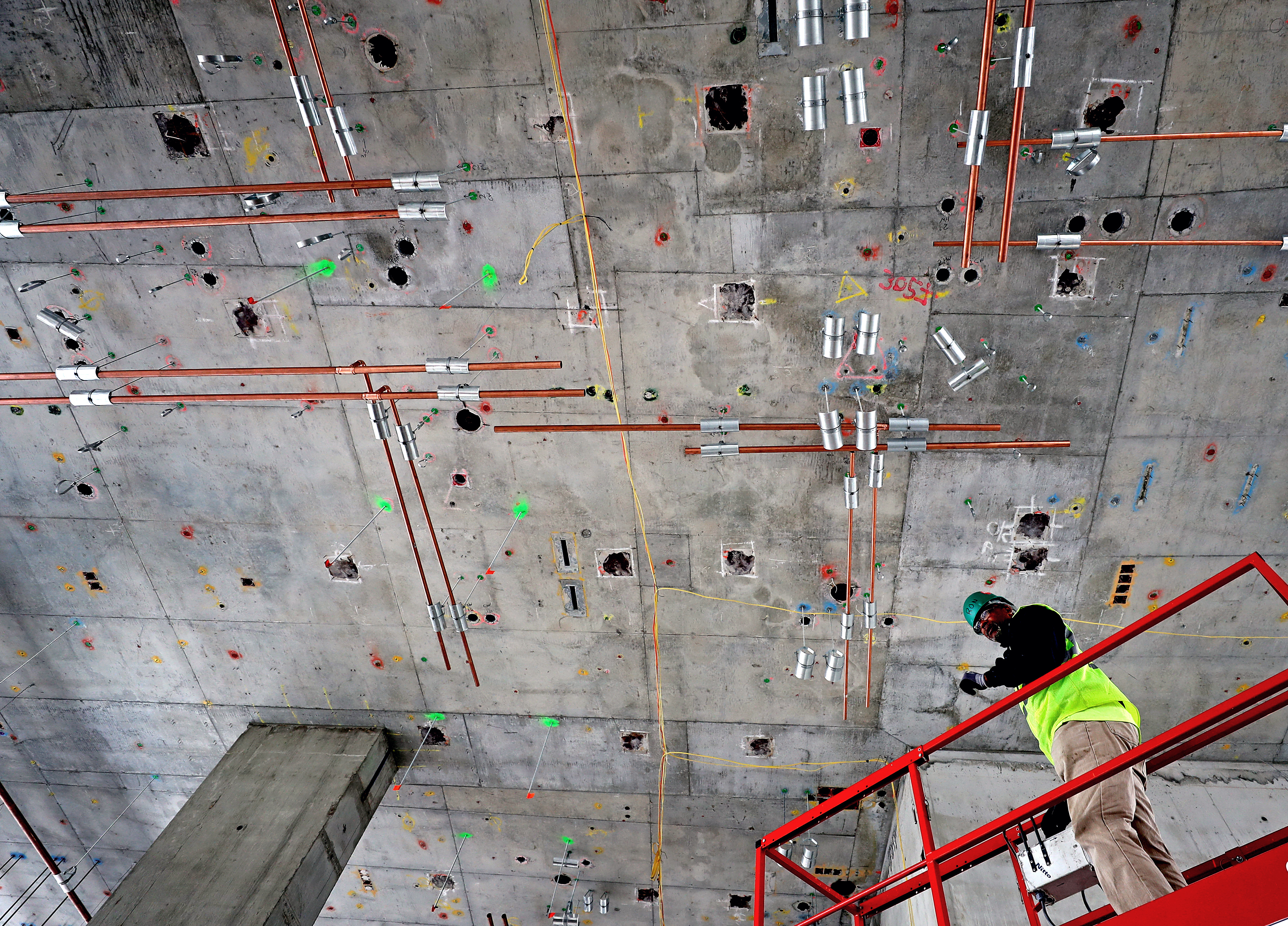 Ronald Lawrence, a plumber, worked on piping.