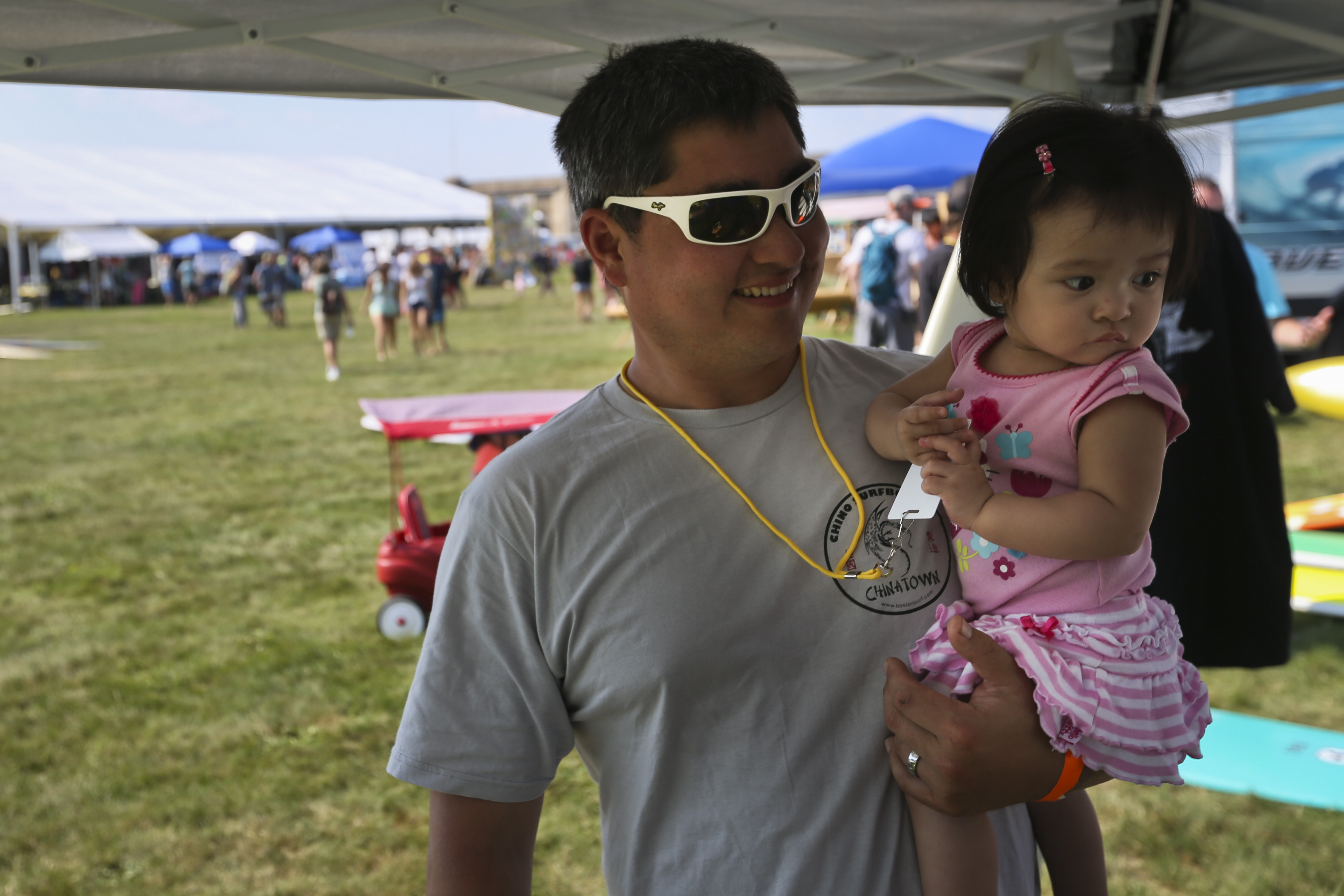 Jonathan Wong, along with his daughter, Christine, attended the annual Surf Fest at Fort Adams State Park in Newport, R.I., earlier this month.