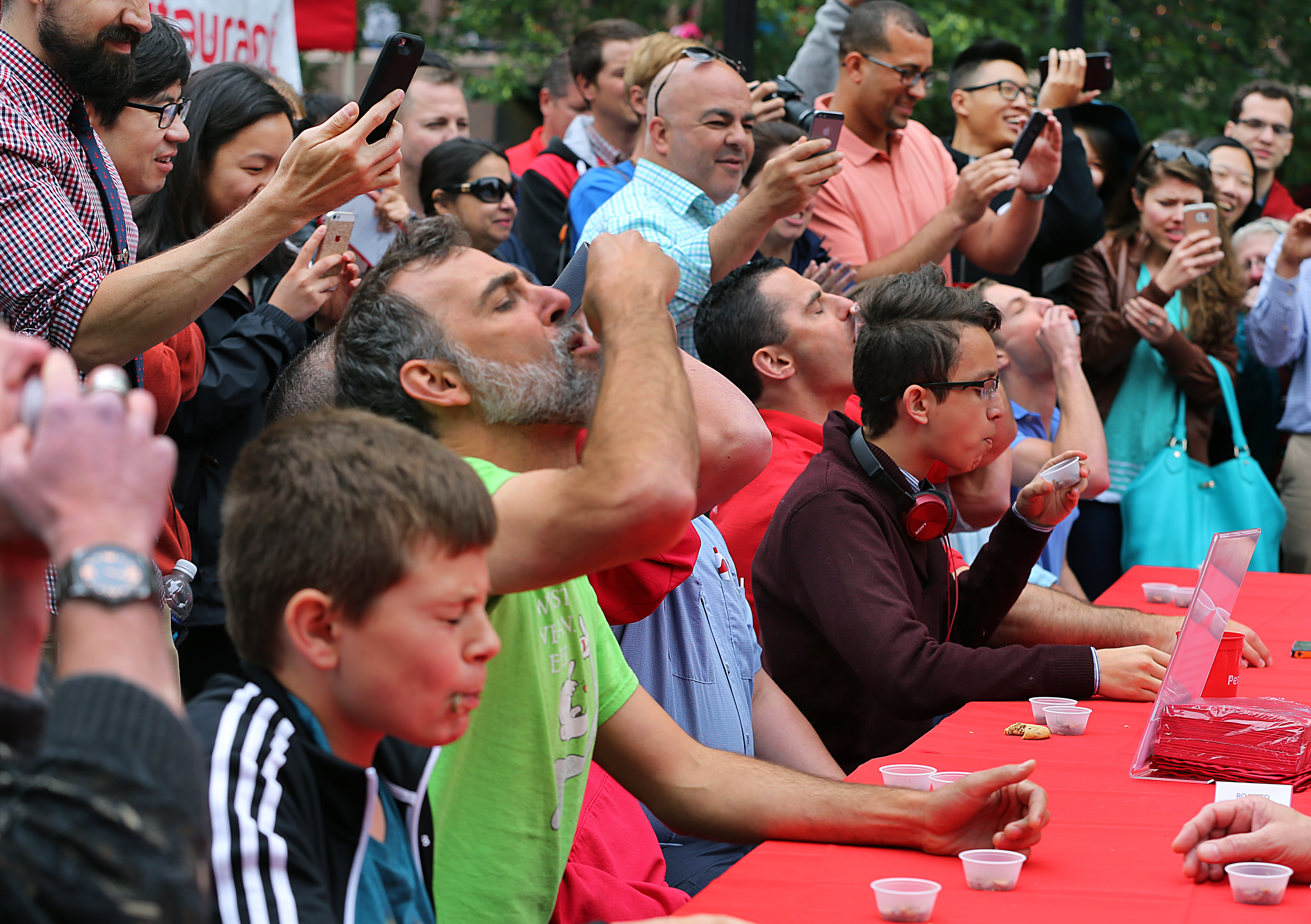 Contestants had to swallow two cups of roasted crickets in the cricket eating competition.