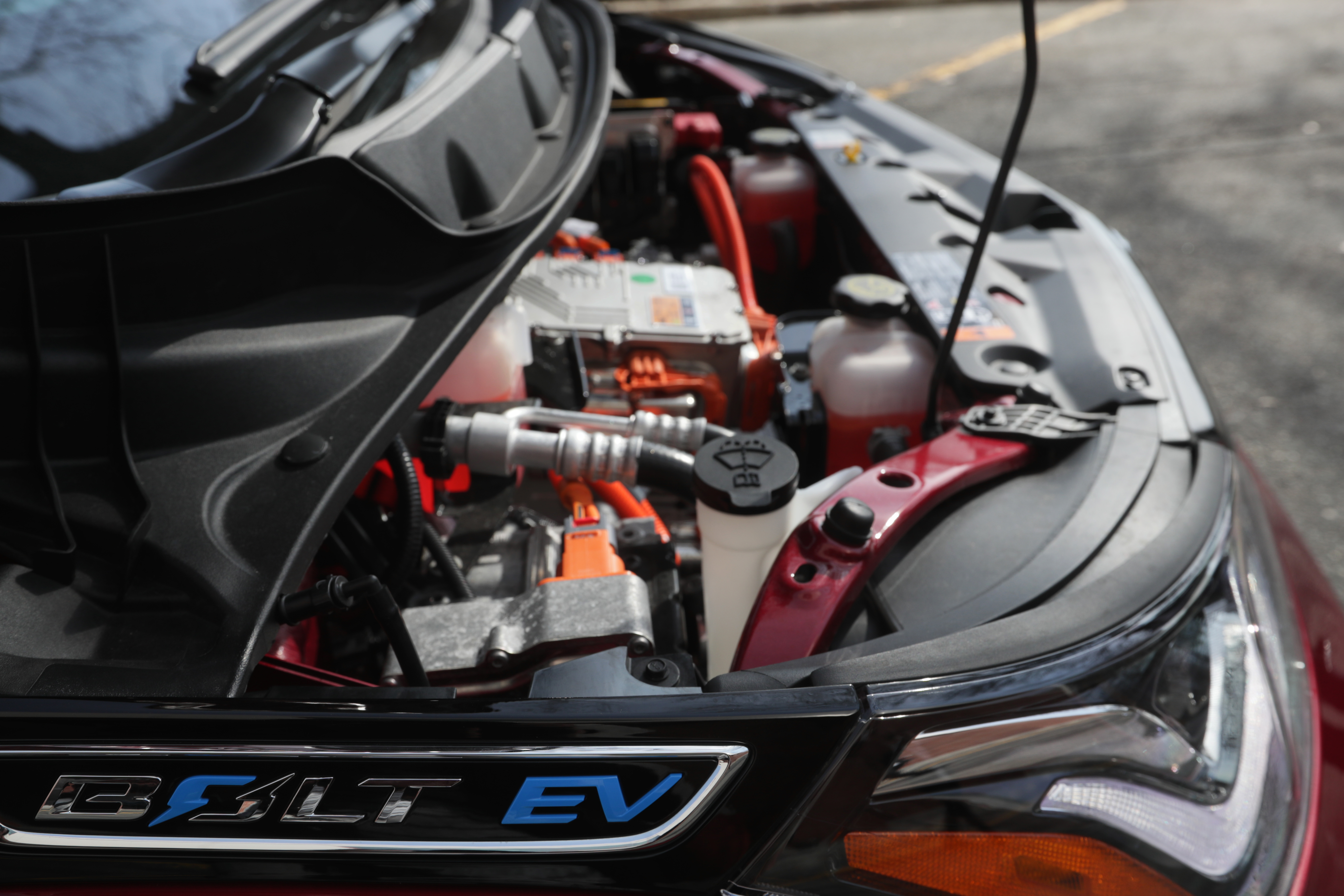Under the front hood of the Chevrolet Bolt.
