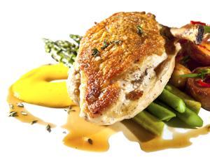 Golden chicken with asparagus and potatoes at Tico in Boston.