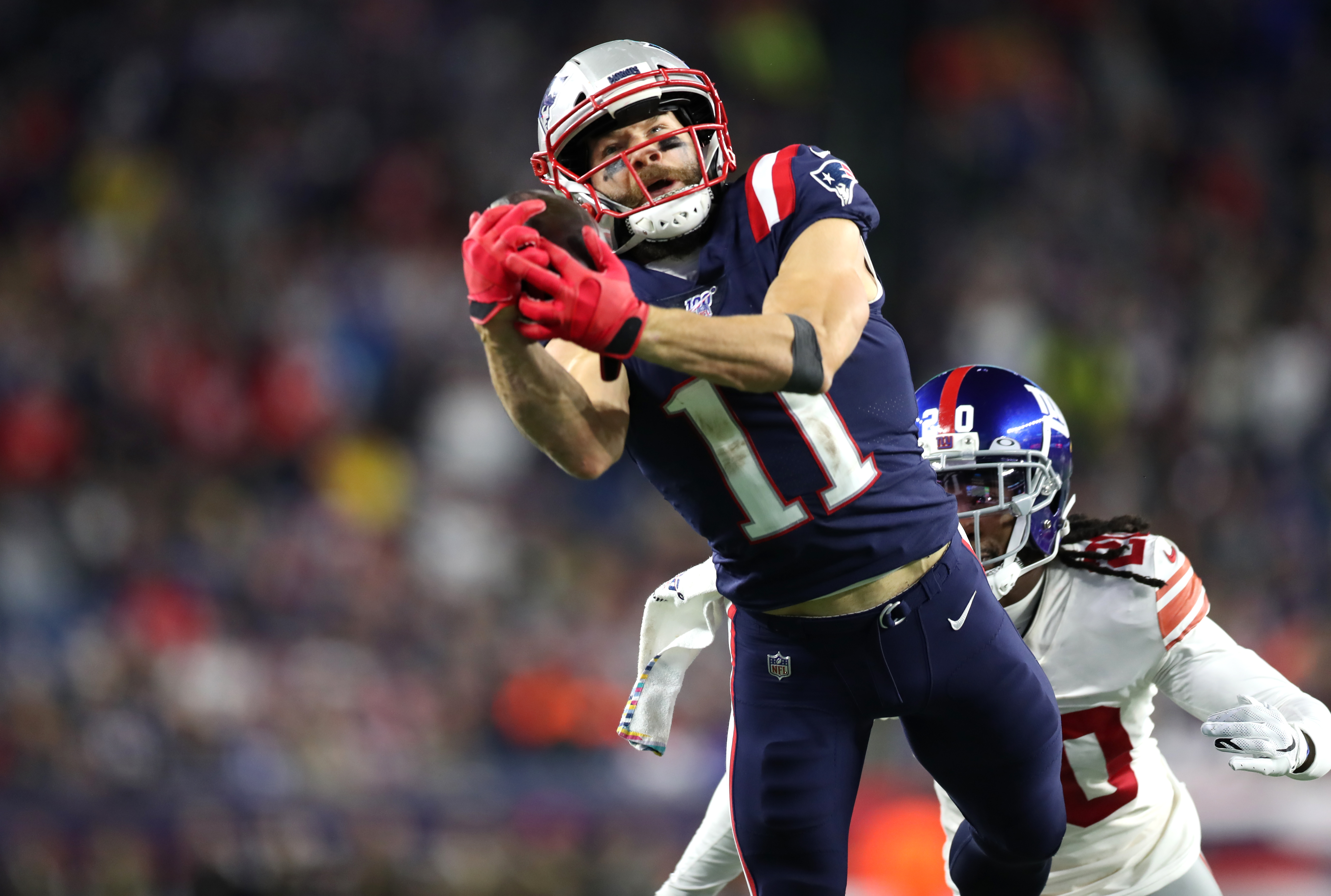 Julian Edelman hauled in a long reception near the Giants end zone in the fourth quarter.