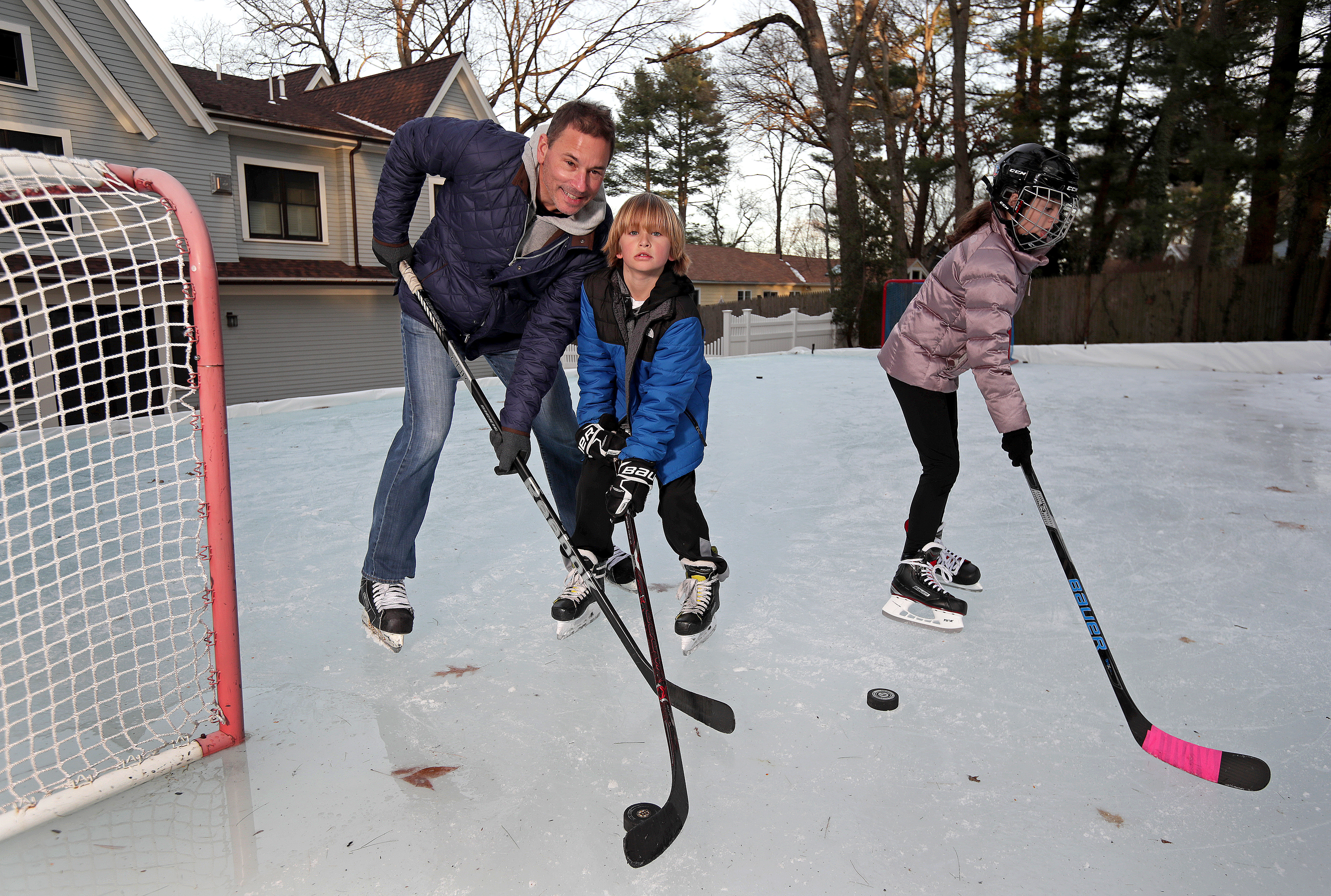 Bruce Cassidy with his son Cole, 8, and daughter Shannon, 9.