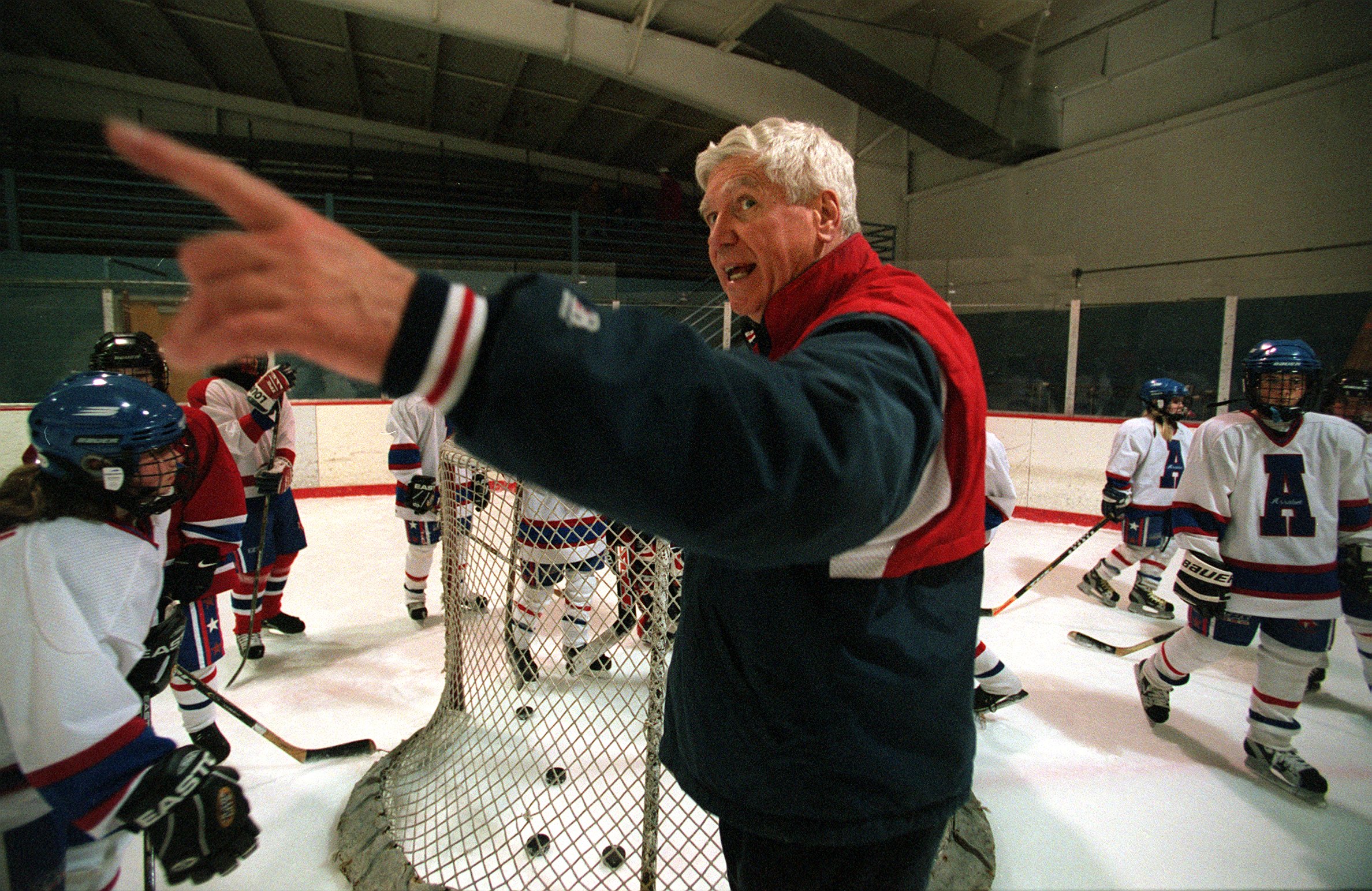 Carl Gray, shown in 2001, has created a program known for its success: 52 national titles, and more than 300 girls who have skated in his program have received college athletic scholarships. Some have even won Olympic medals.
