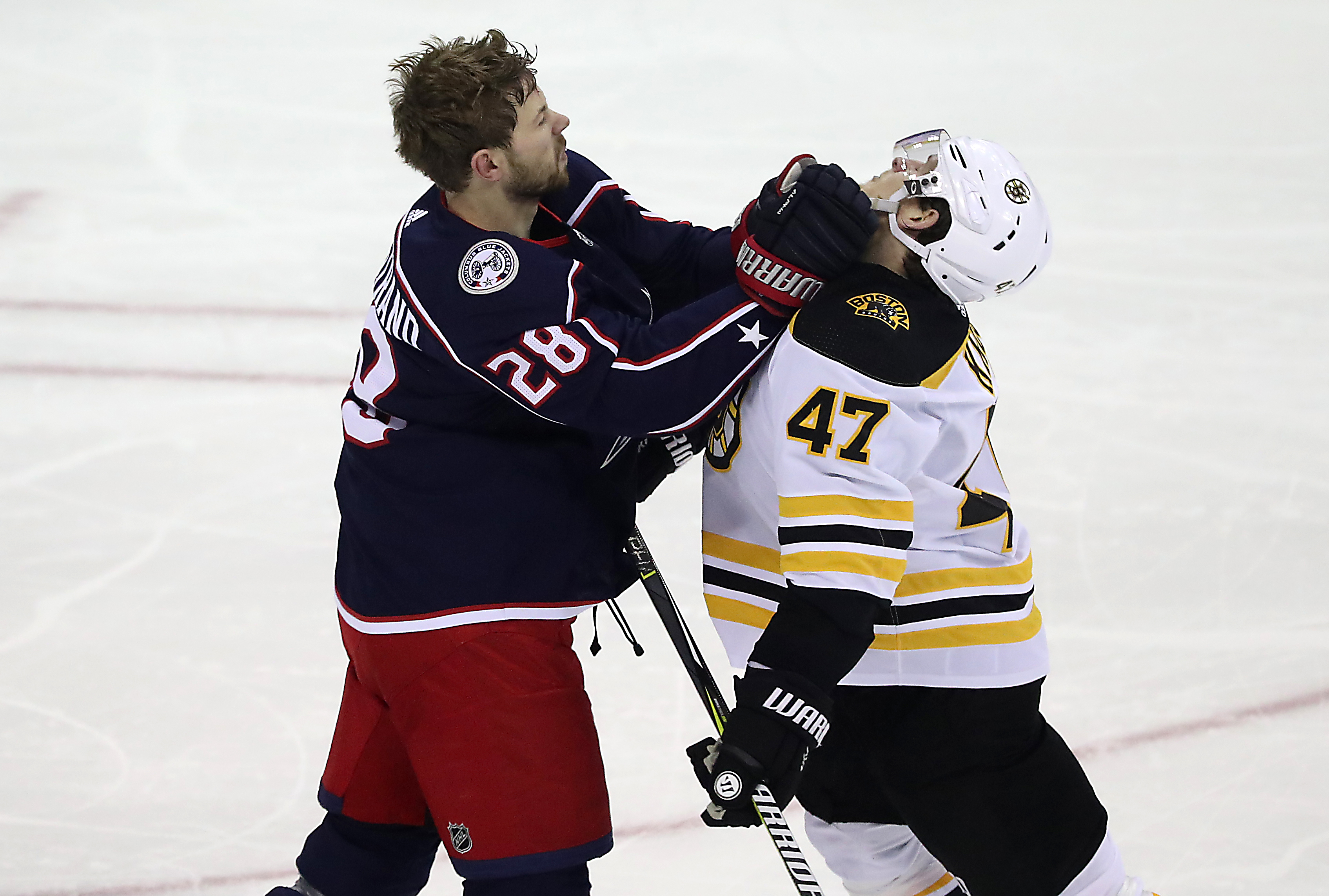 Oliver Bjorkstrand had the upper hand on Torey Krug in the second period.