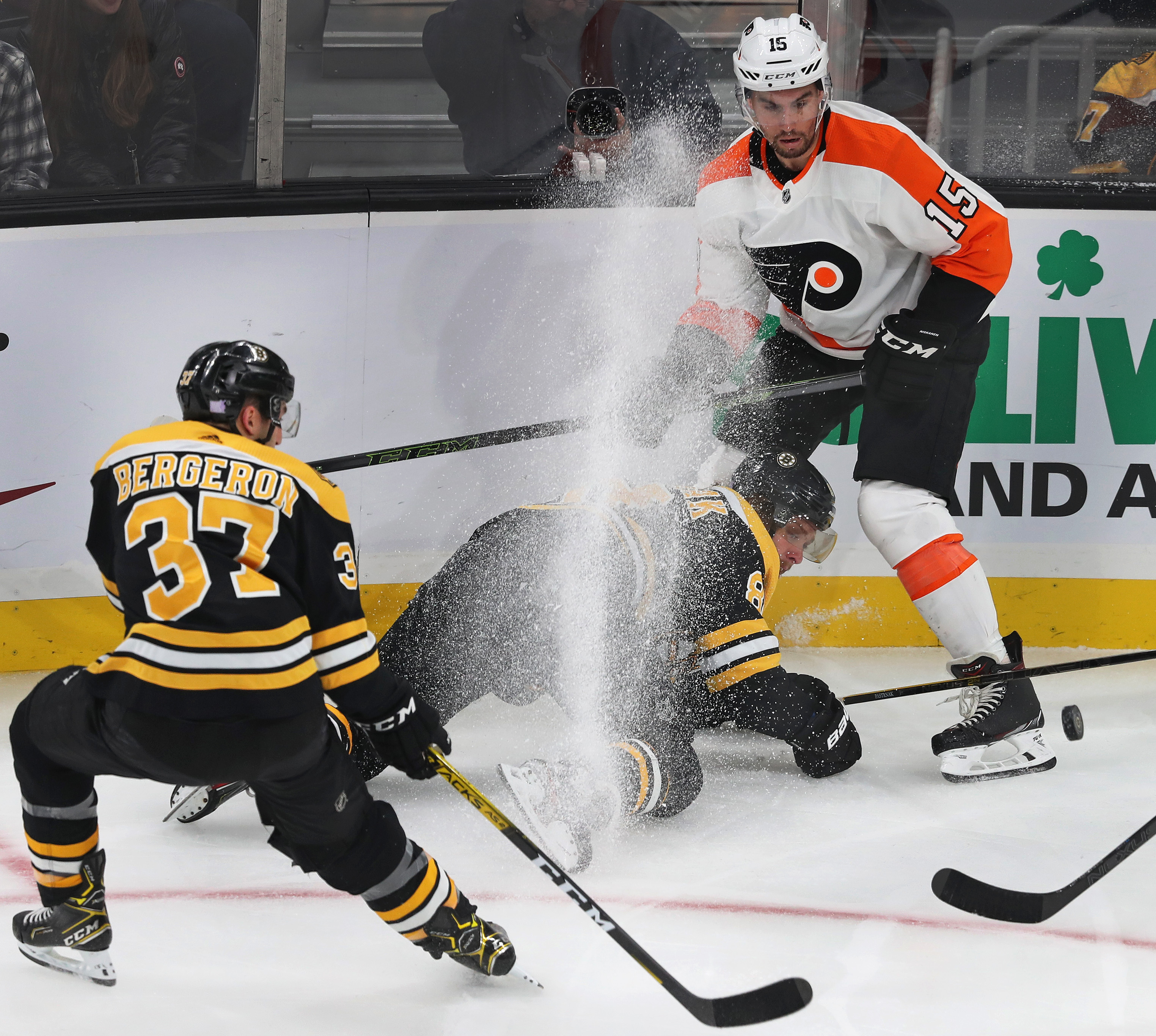Patrice Bergeron treated Philadelphia’s Matt Niskanen to an icy reception along the boards after the Flyer knocked David Pastrnak off the puck in the first period.