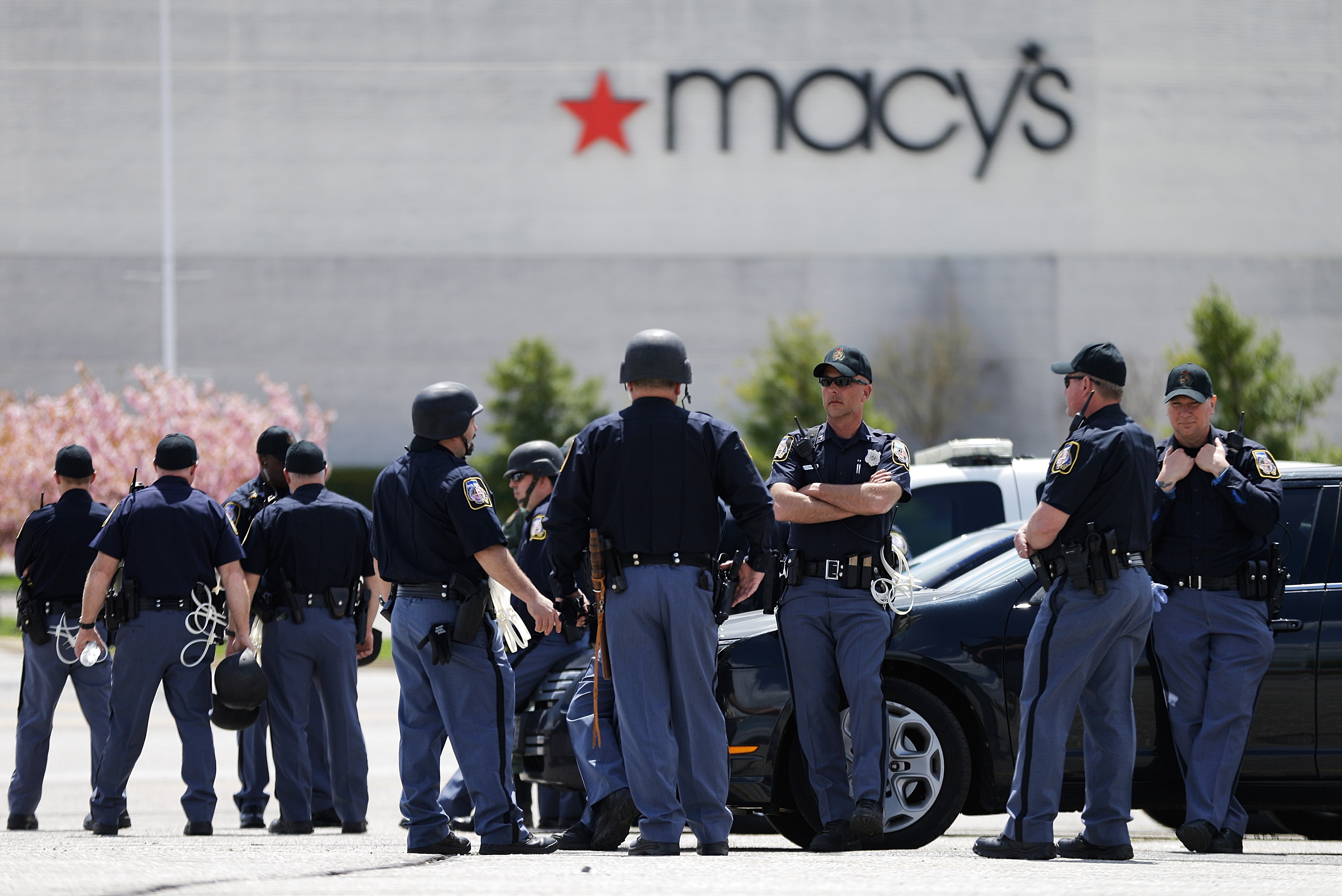 Police stood watch outside Security Square Mall.