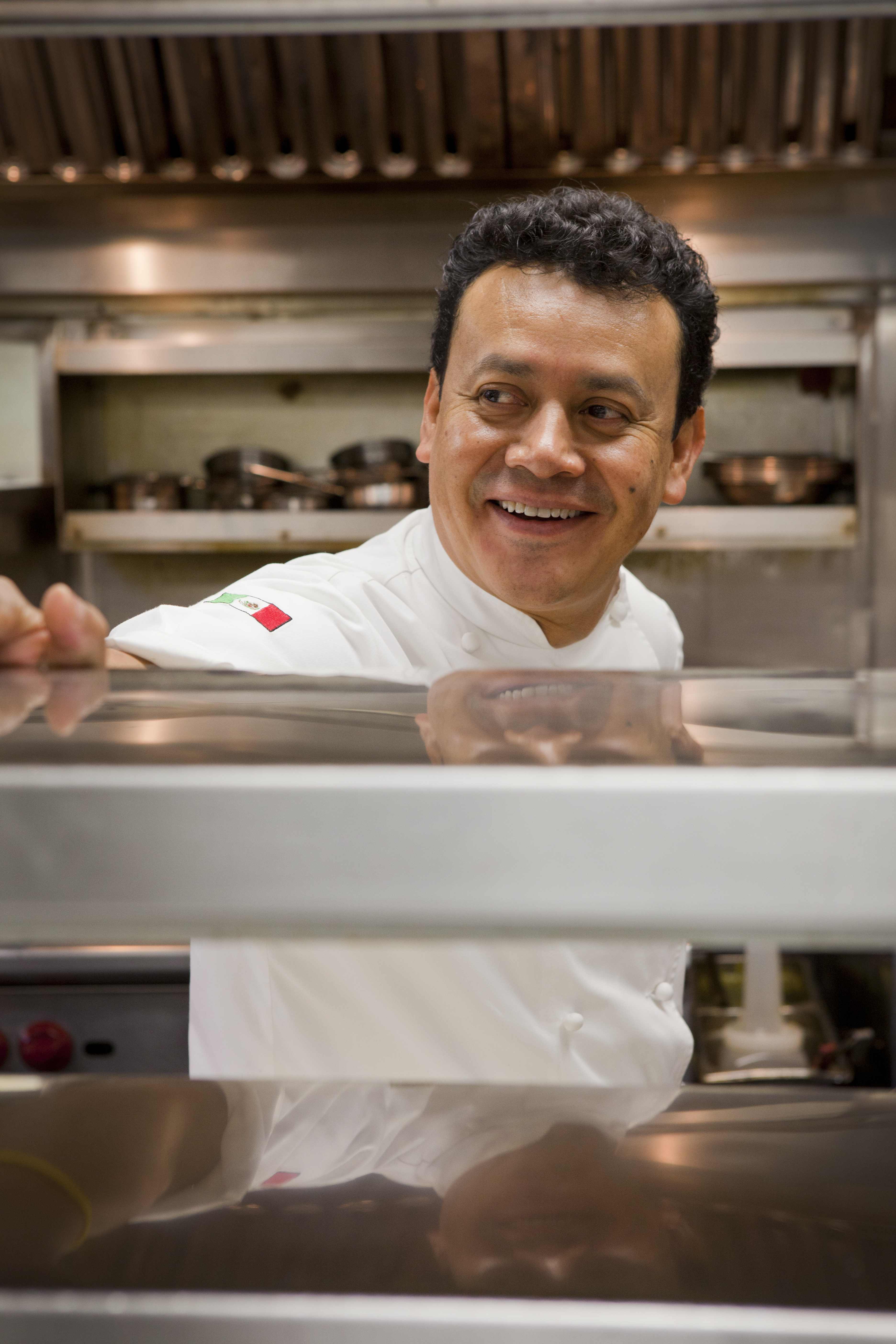 Chef Hugo Ortega in the kitchen at Hugo’s.