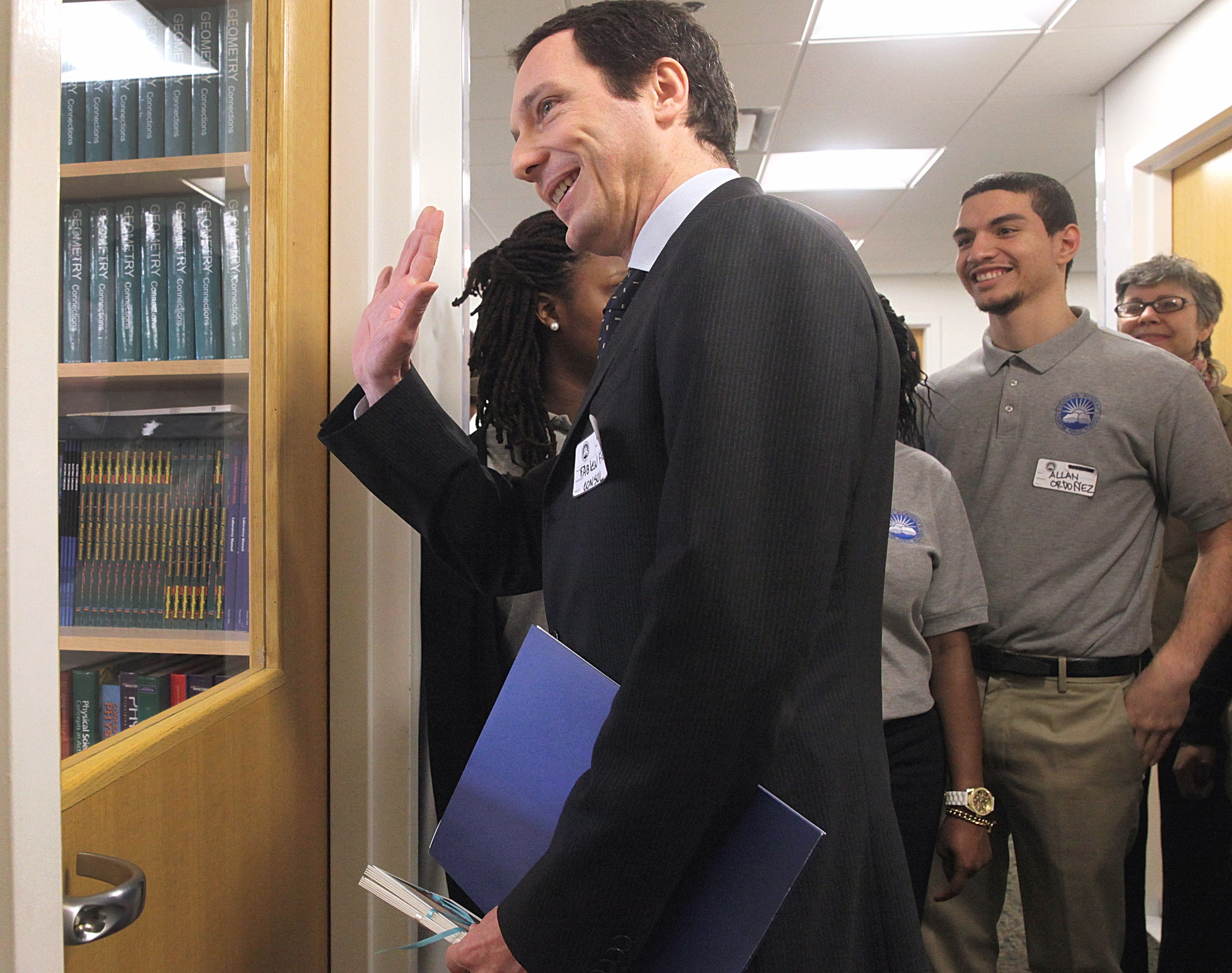 French Consul General Fabien Fieschi waved to a class during a tour of Codman Academy in Dorchester on Wednesday.