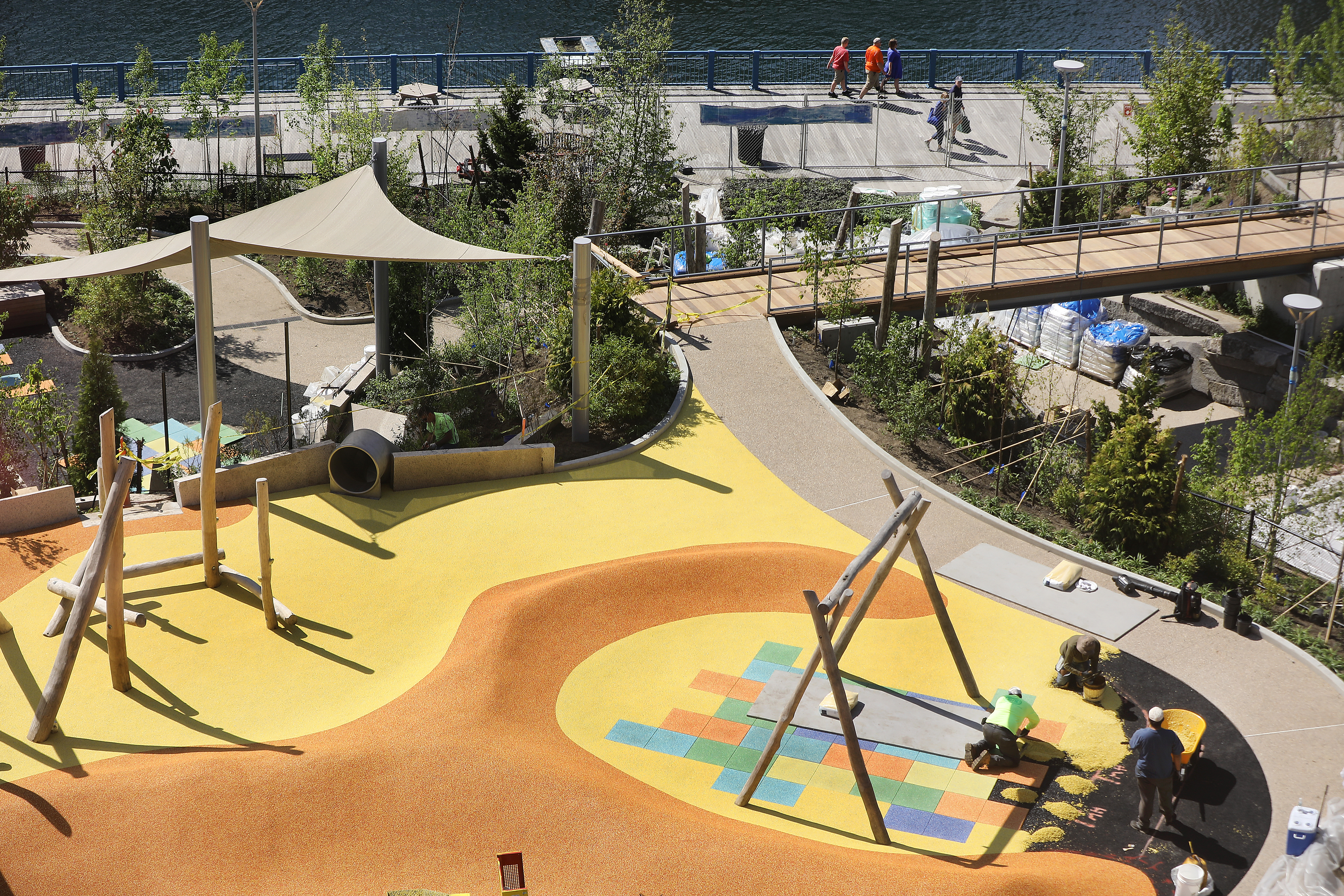 Workers installed a rubber play surface near the nest swing. Jane had drawn sketches of what a playground honoring martin would look like and versions of those drawings were filed with the City of Boston as the park proposal went through the city’s planning process.