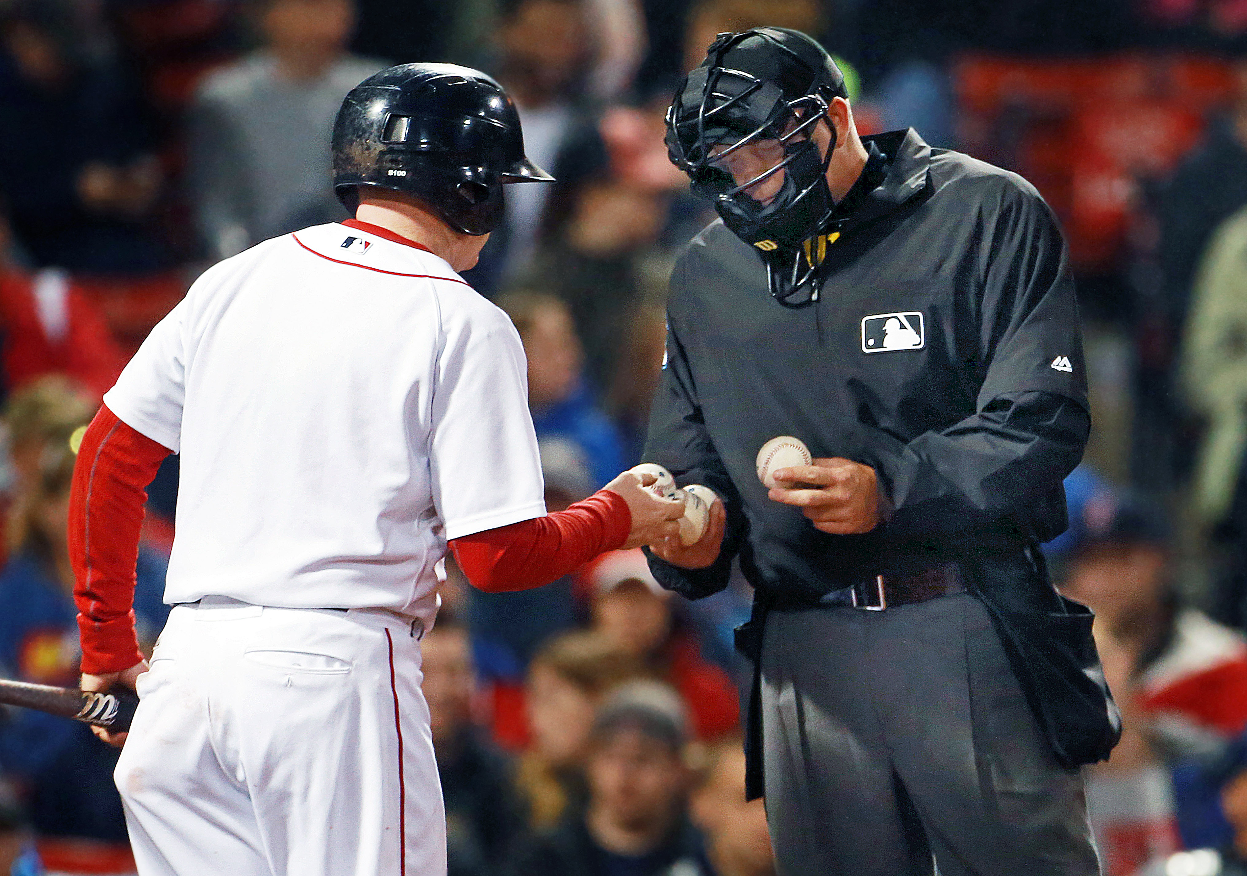 Umpires keep an eye on the baseballs, but will only inspect a pitcher if requested by a manager.