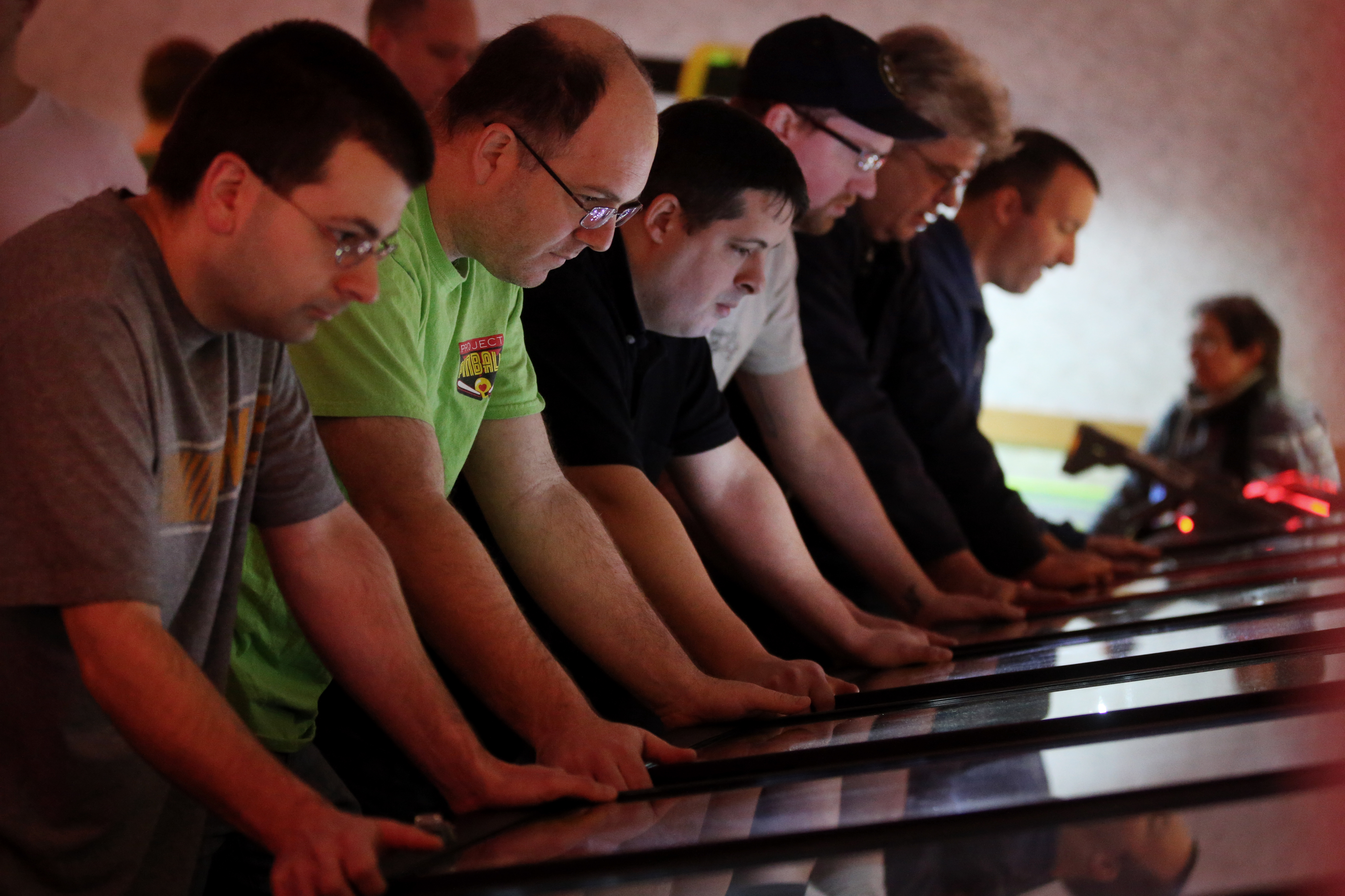 Bowen Kerins (second from left), of Salem, took part in Saturday’s IFPA Massachusetts State Pinball Championship at Lanes and Games in Cambridge.