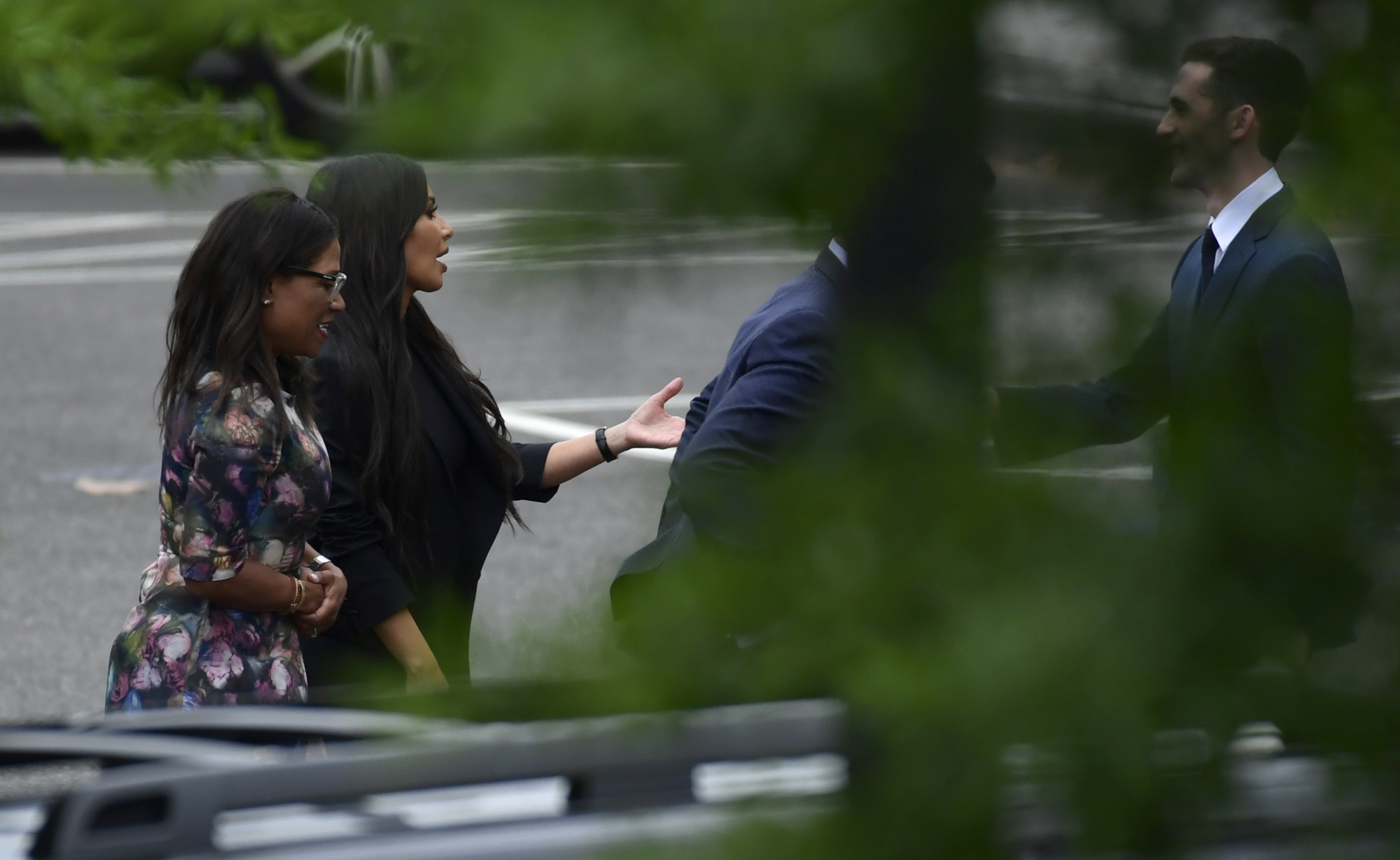 Kim Kardashian West, second from left, left the West Wing of the White House on Wednesday.