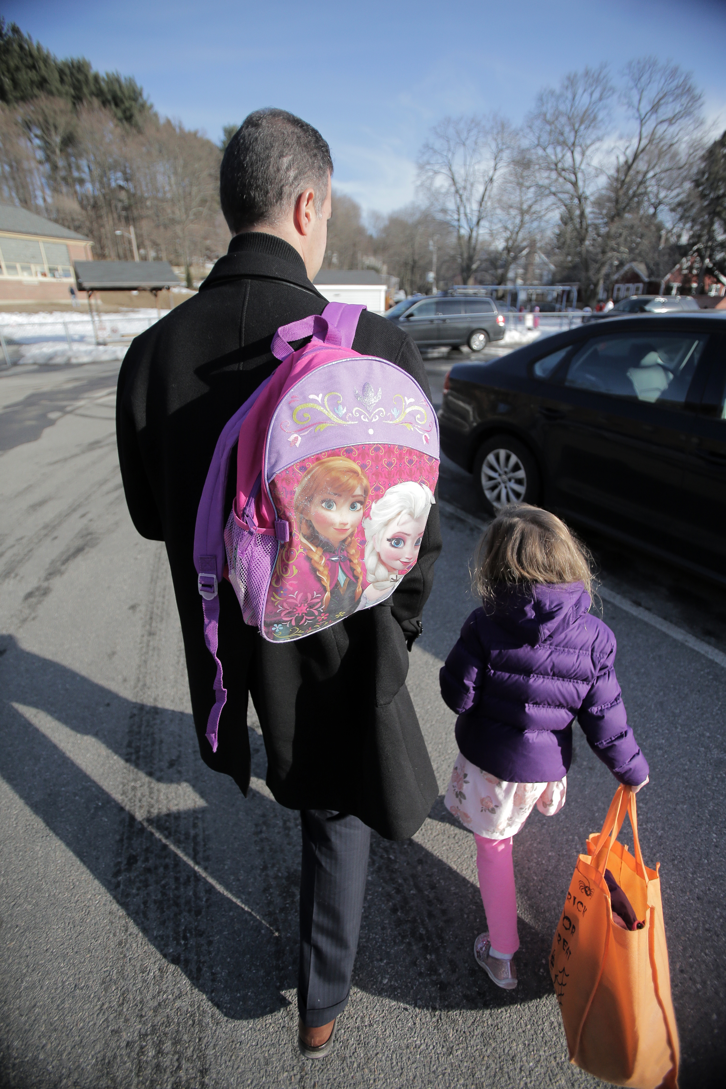 Jason Manekas picked up his daughter from day care one recent afternoon.