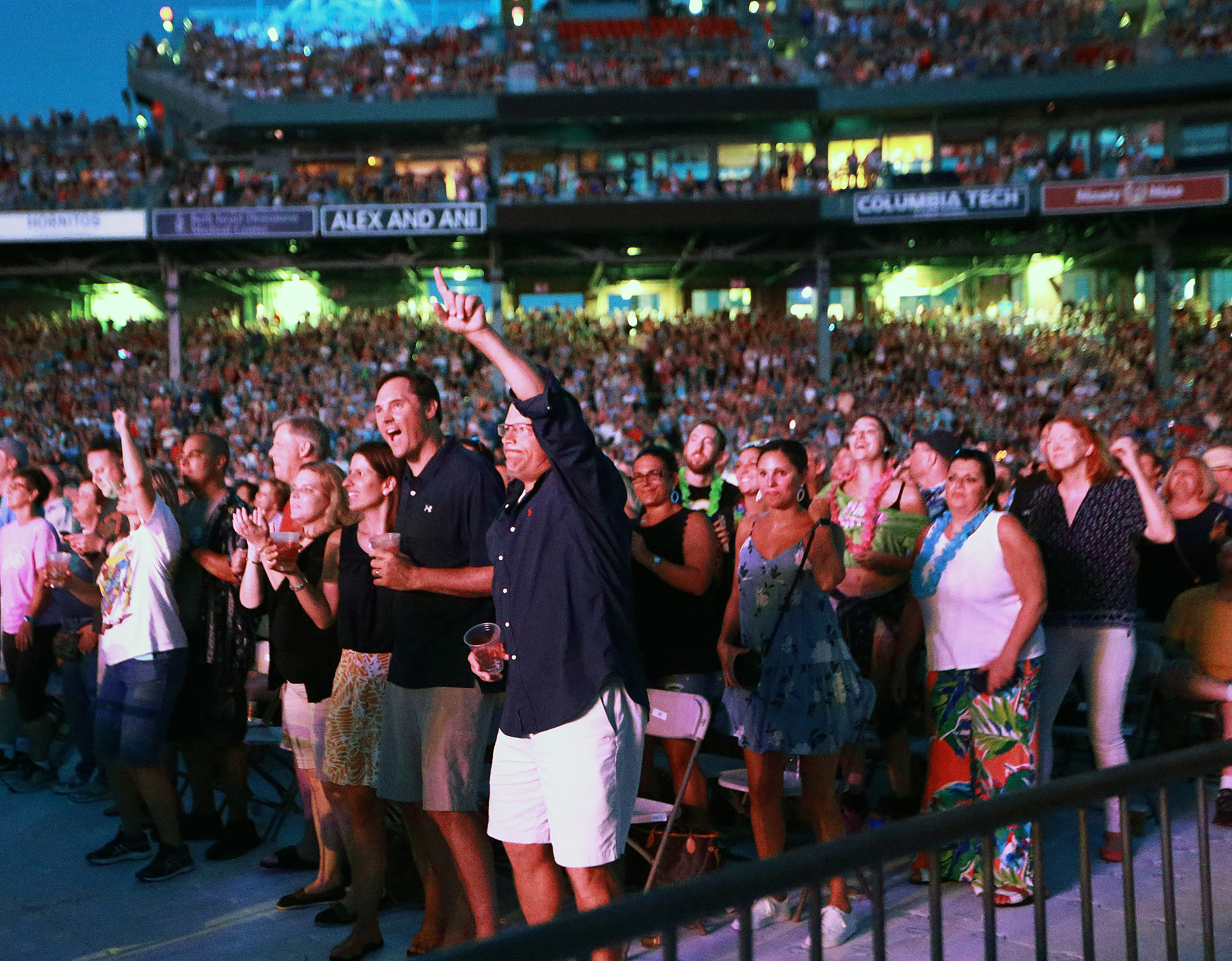 Fans watch as Buffett performs.