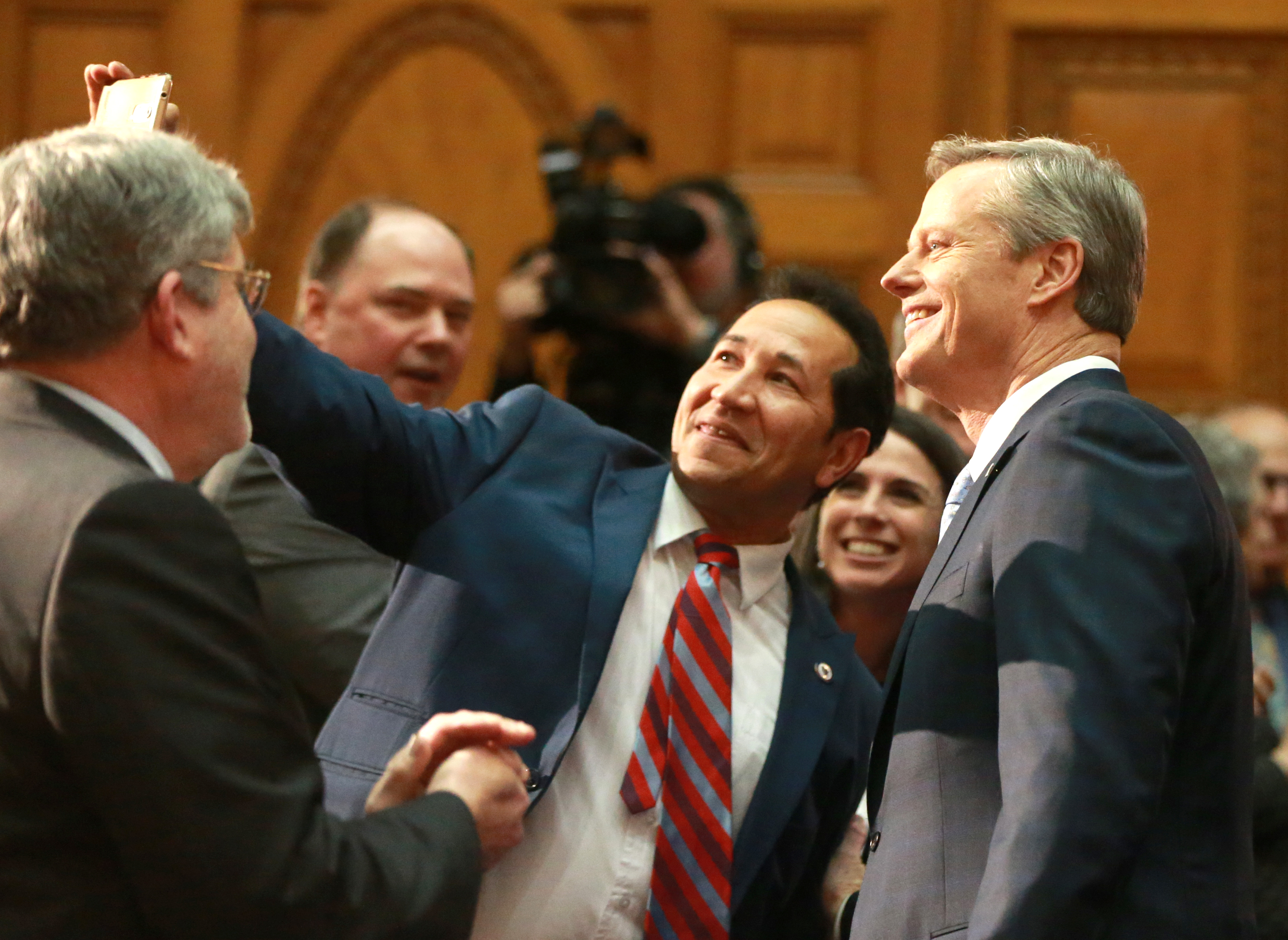 Governor Charlie Baker posed for a selfie with Carlos Gonzalez a State Rep from Springfield.