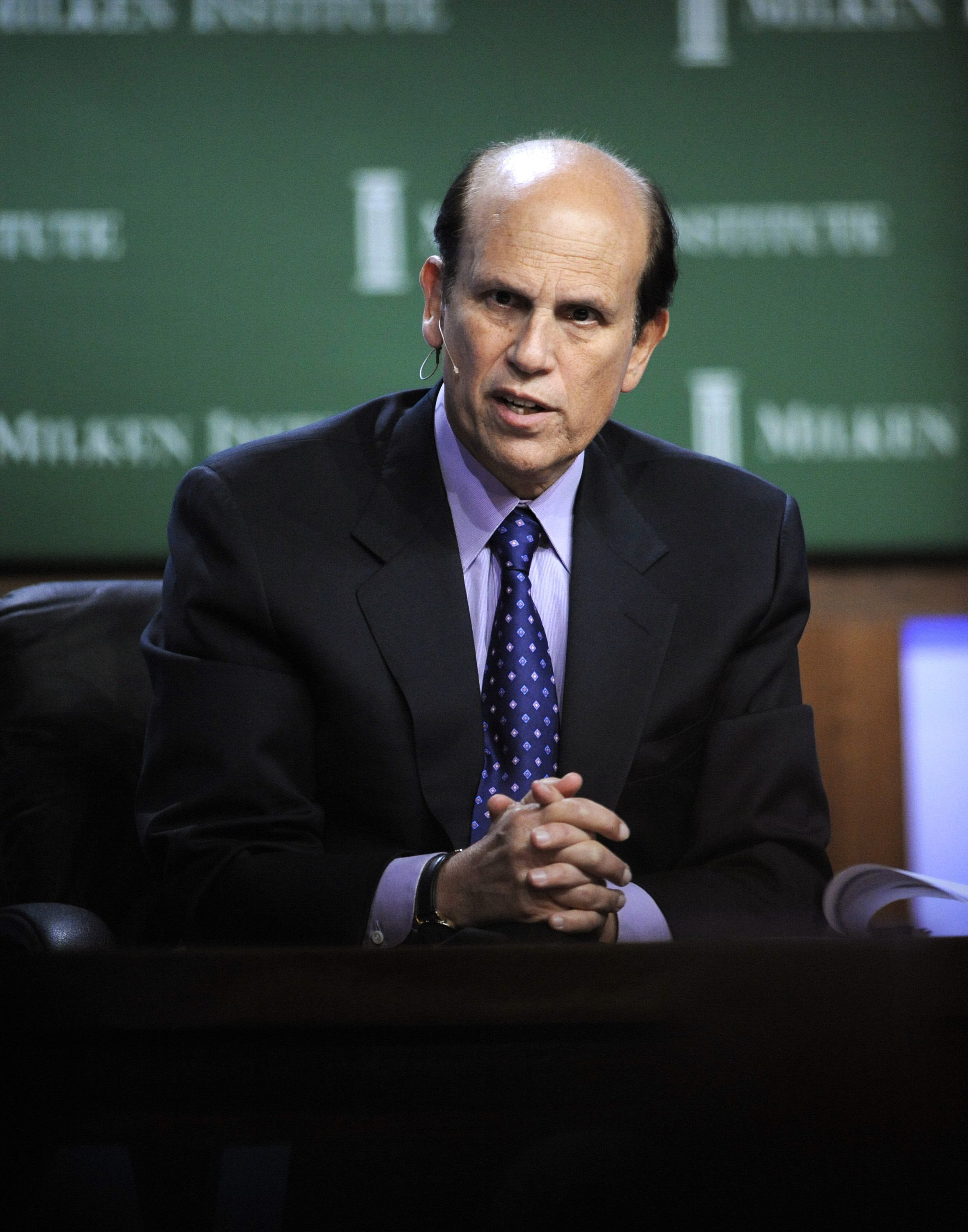 Michael Milken, moderating a panel at the Milken Institute Global Conference.