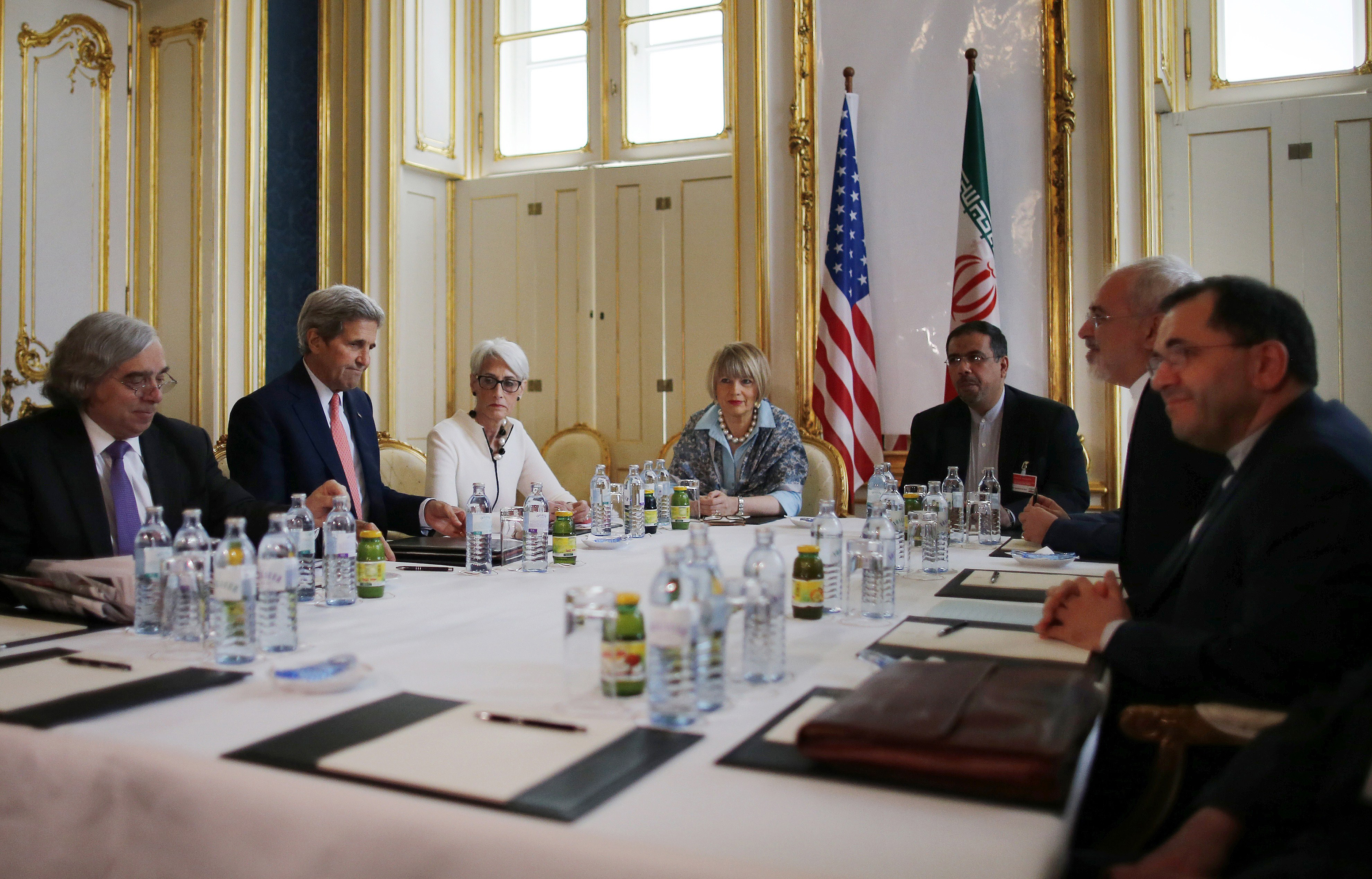 From left: Ernest Moniz, Secretary of State John Kerry, and Undersecretary for Political Affairs Wendy Sherman meet with Iranian Foreign Minister Mohammad Javad Zarif (second from right) and his delegation in Vienna in June.