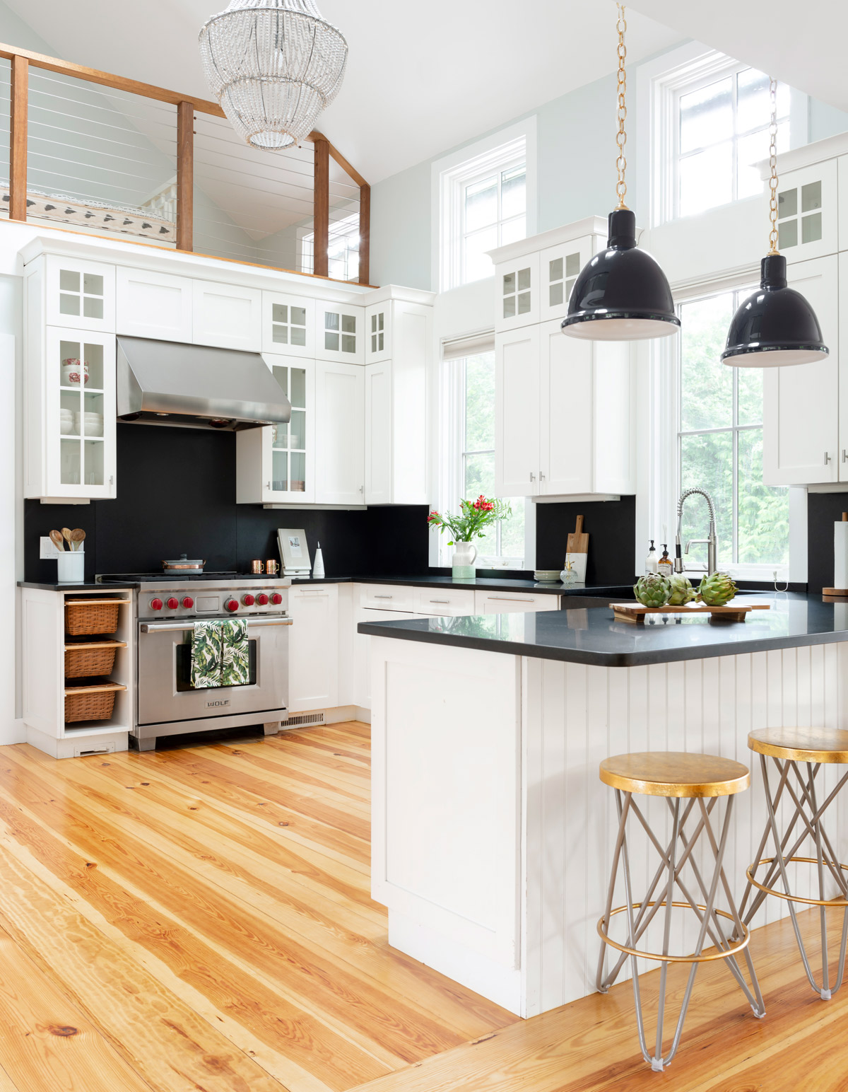 The Viking range, soapstone counters, and soapstone farm sink were already in place. “Overall, we kept the kitchen intact,” says Burns.