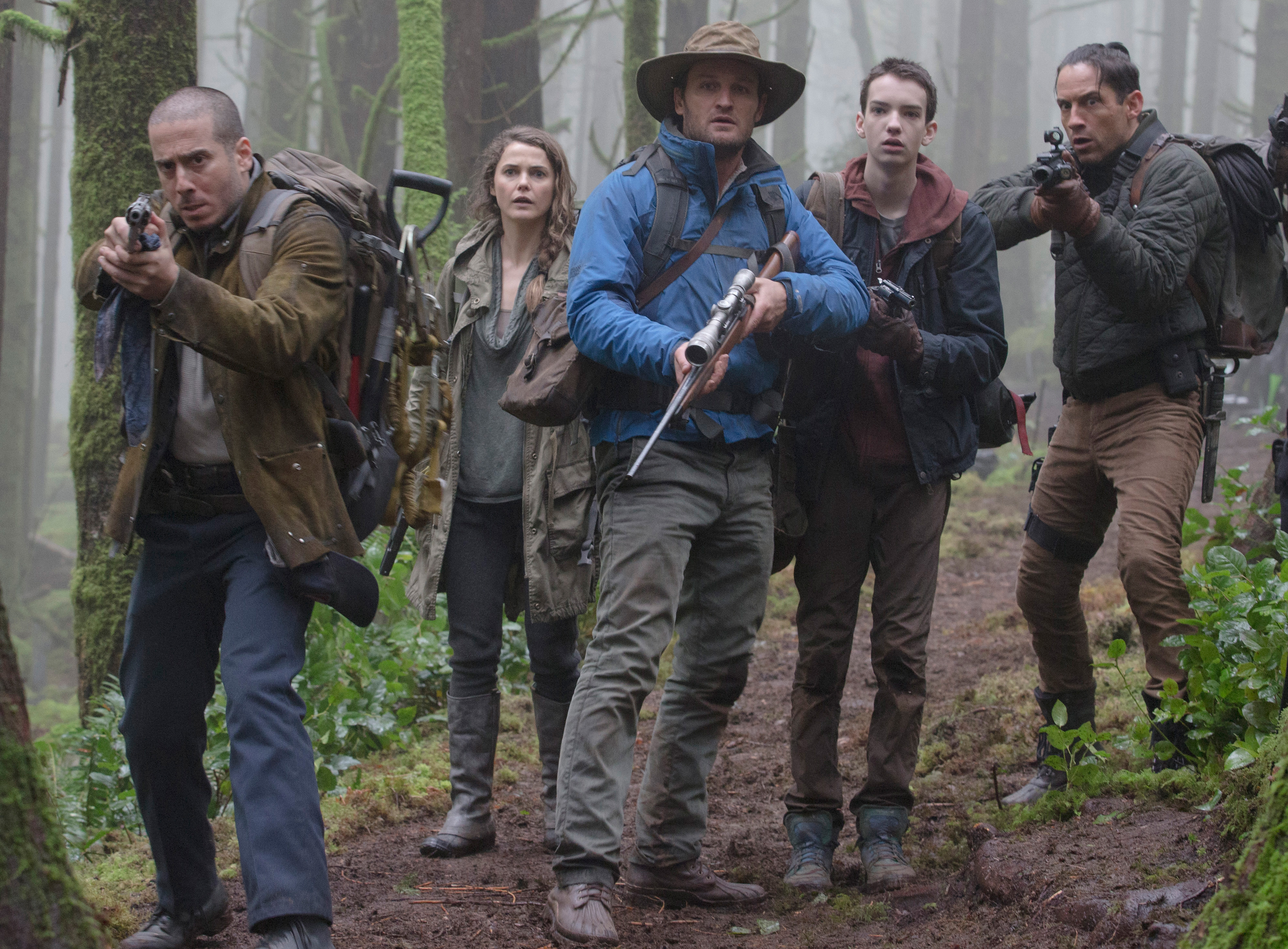 The human crew (at left, from left): Kirk Acevedo, Keri Russell, Jason Clarke, Kodi Smit-McPhee, and Enrique Murciano.