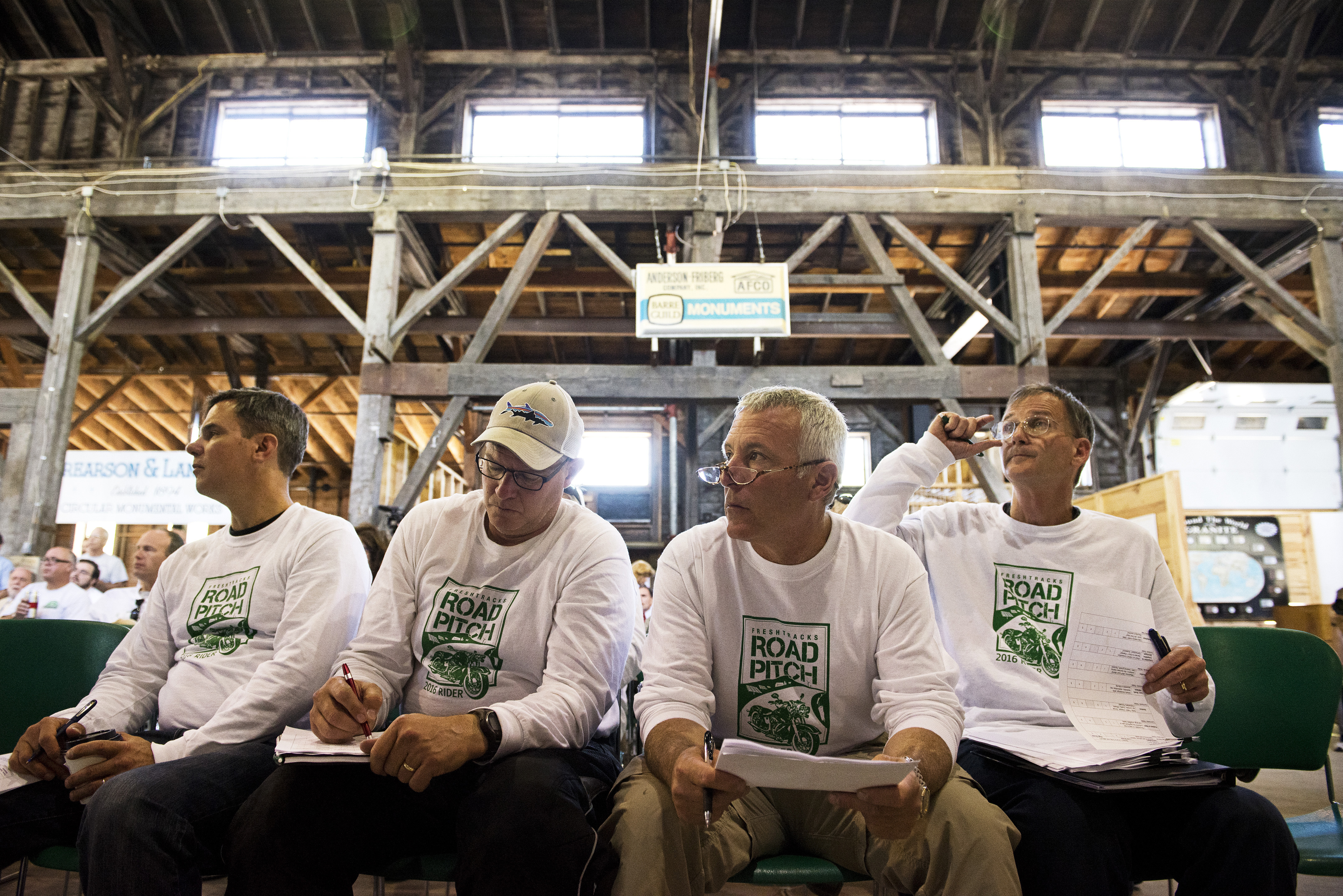 From left: venture capitalits James Lockridge, Tom Myers, Jeff Finkelstein, and Cairn Cross listened to a presenation during the Central Vermont Road Pitch.