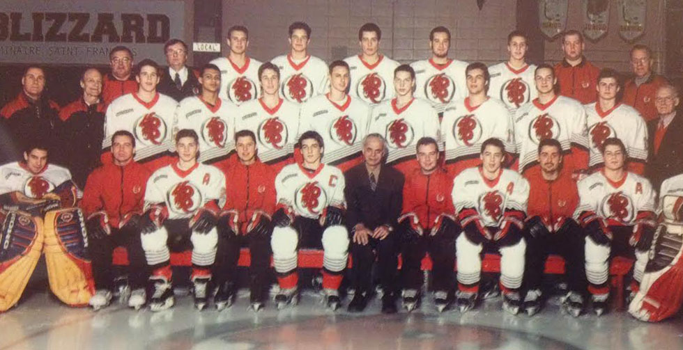Bergeron (foreground with captain’s “C” on his jersey), in his high school team photo.