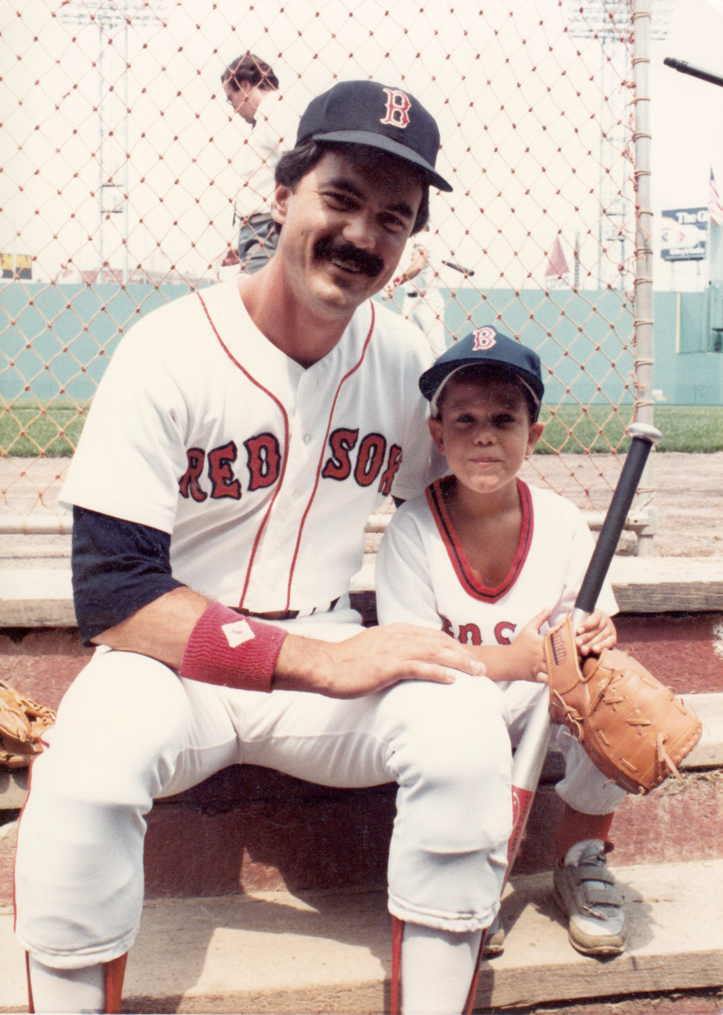 Dwight Evans and Justin Evans at a father-son baseball game at Fenway park.