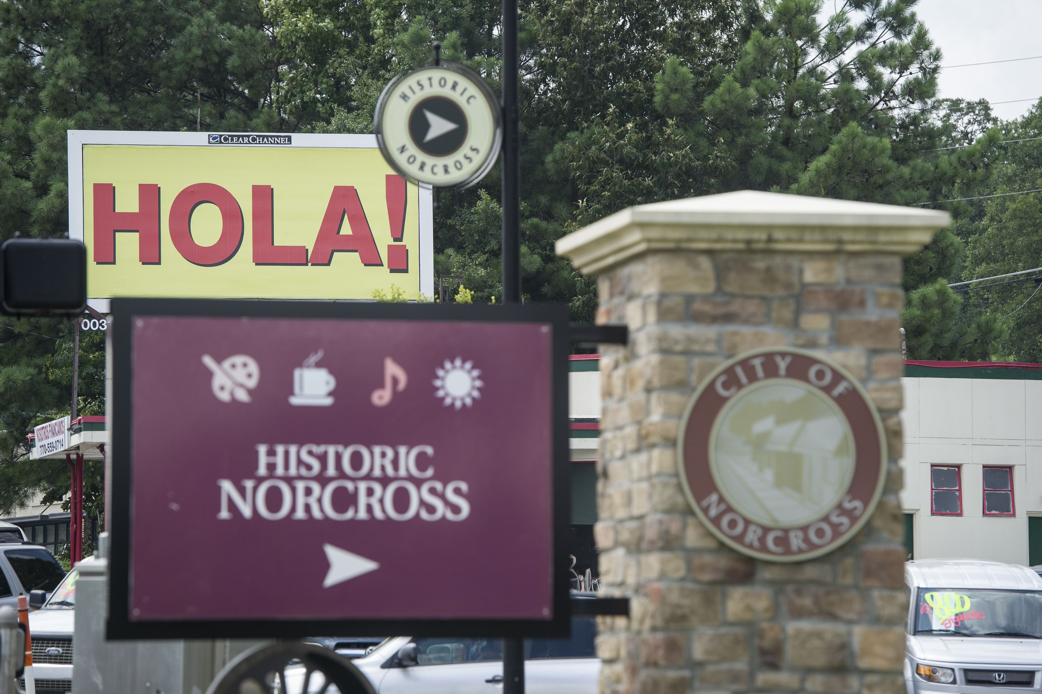 A billboard displayed the Spanish word for hello as seen along Buford Highway.