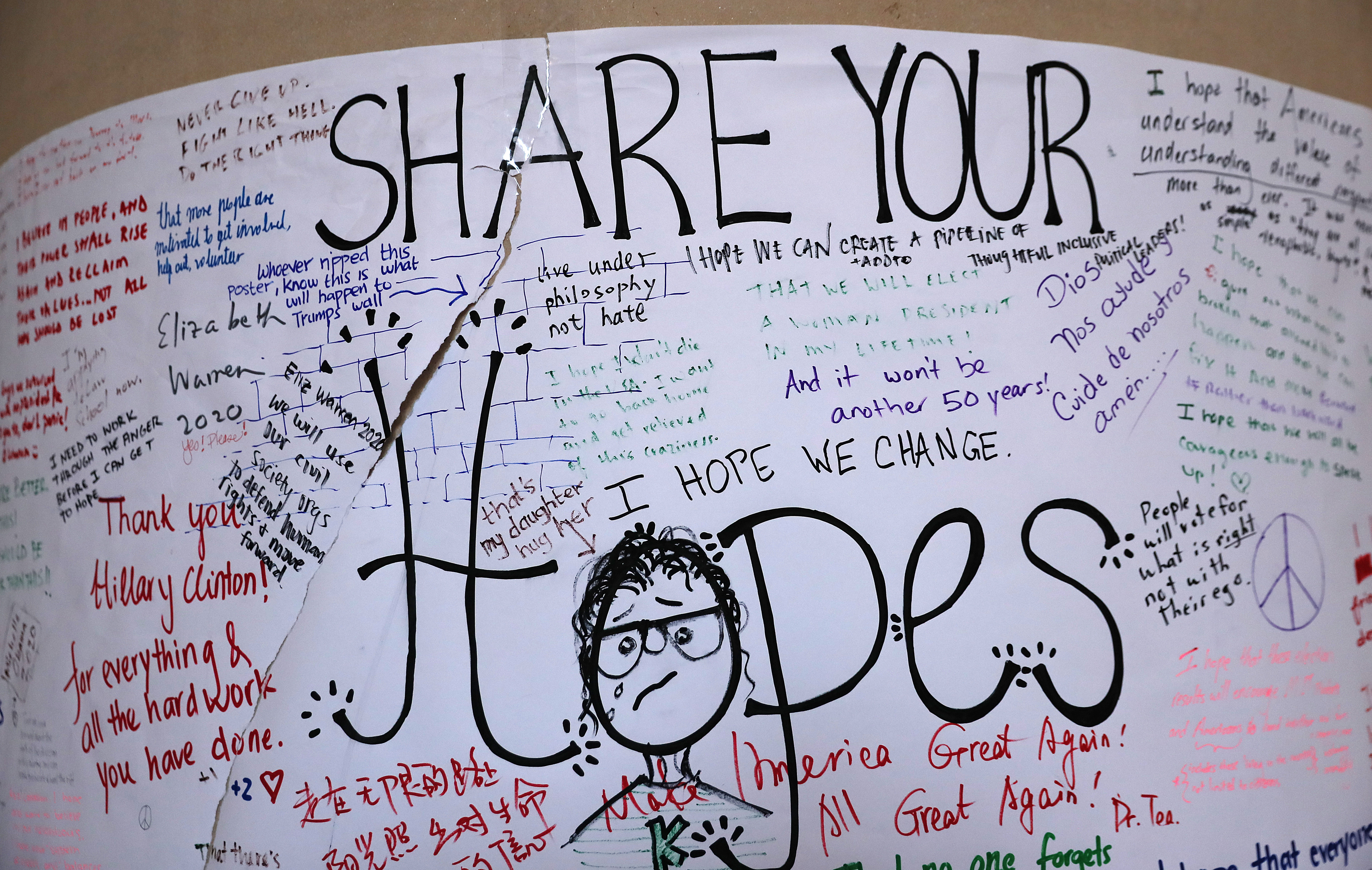 Students wrote messages on paper posted to columns at MIT’s Lobby 7.