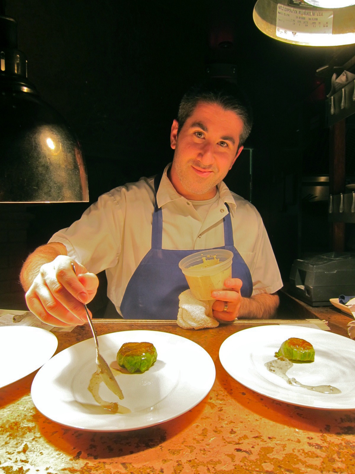 Chef Michael Solomonov plated dishes at Zahav, which means “gold’’ in Hebrew and is a reference to Jerusalem.