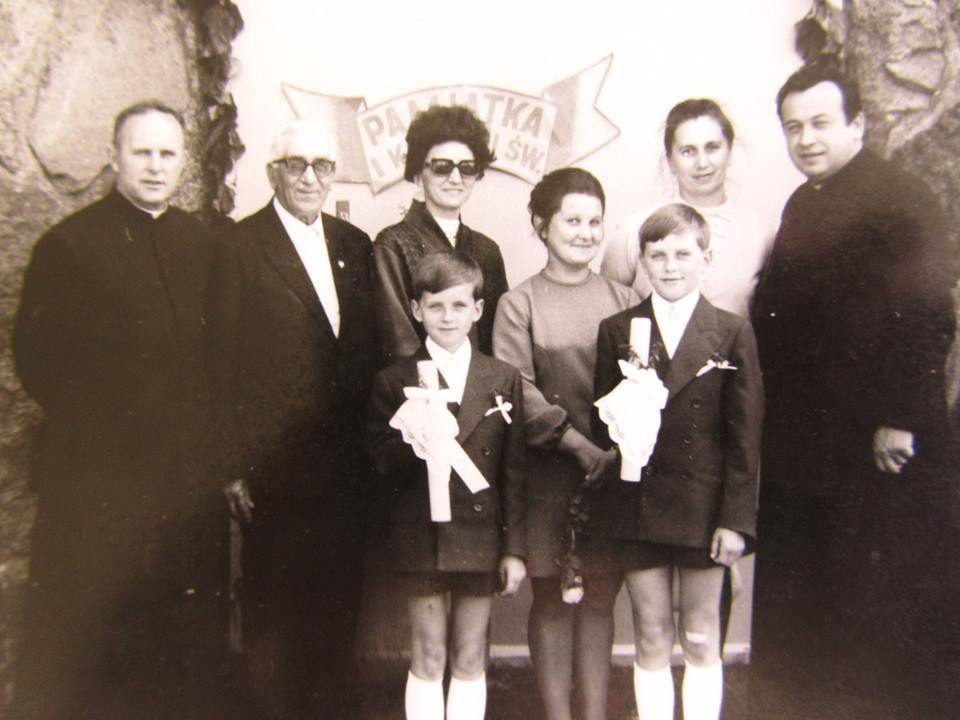 Janusz Kowalski (front row, left) with his father, the Rev. Boleslaw Petlicki (far left), and mother, Regina Kowalska (back row, second from right).
